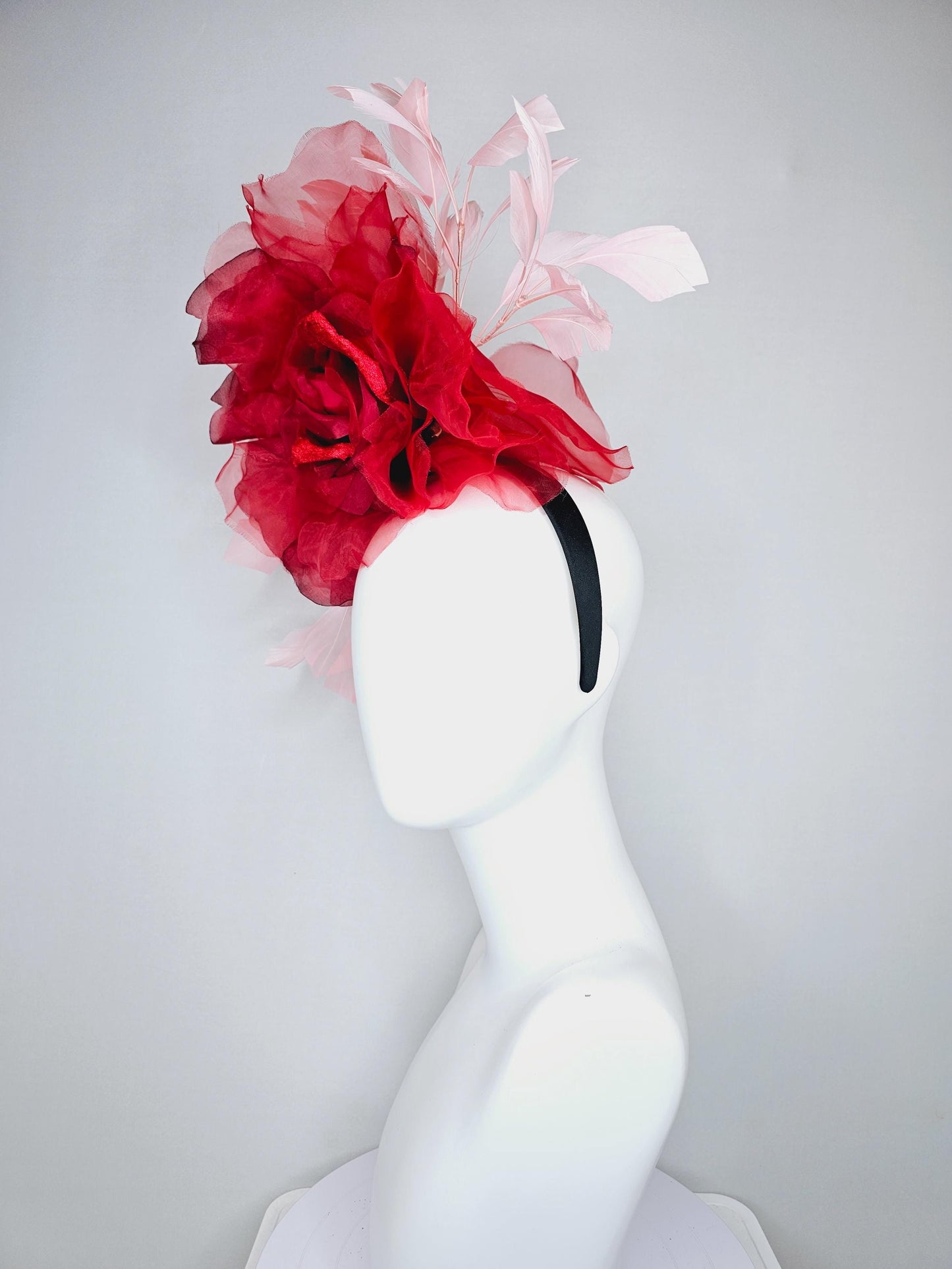 kentucky derby fascinator black headband with large red organza flower and blush light pink branching feathers