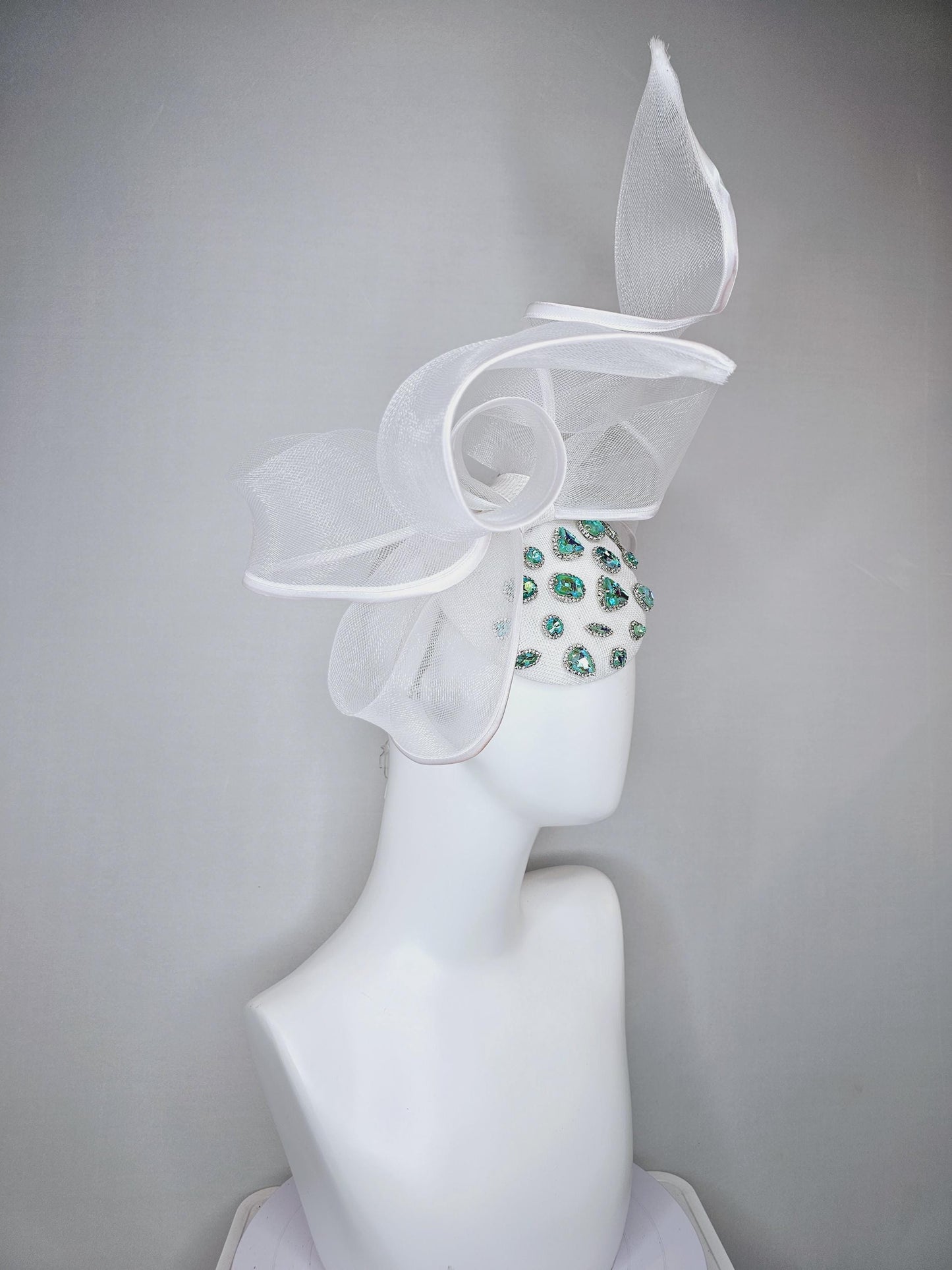 kentucky derby hat fascinator ivory white fabric base w/ mesh and wired ribbon large bendable bow decor,turquoise blue green crystal jewels