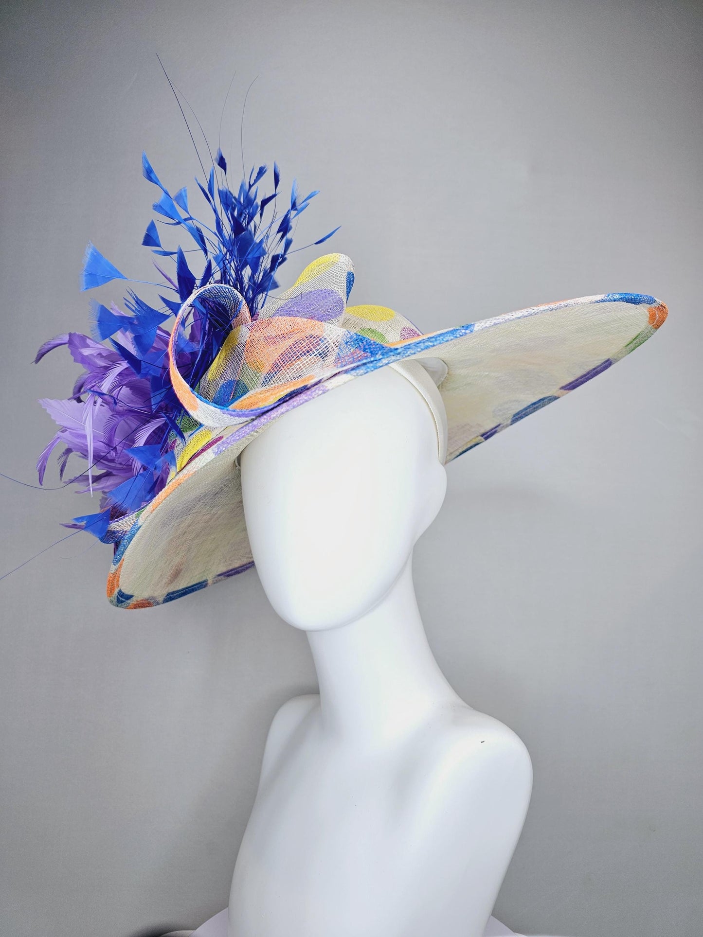 kentucky derby hat large colorful rainbow blue green yellow orange polka dot wide brim sinamay,purple feather flower and royal blue feathers