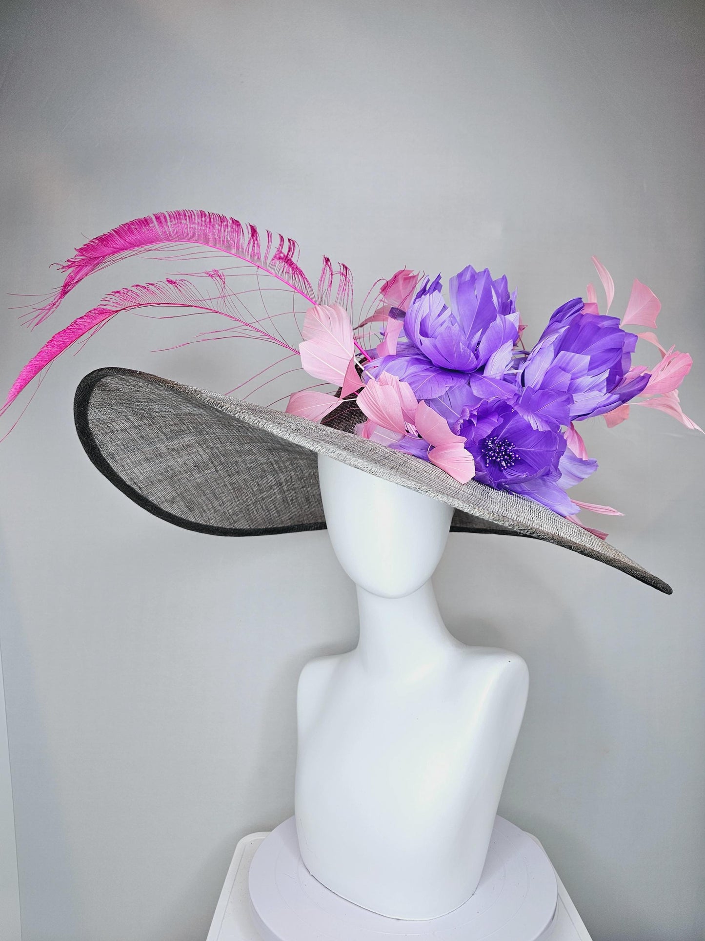 kentucky derby gray sinamay large wide brim hat with purple feather flowers and branching light pink feathers with hot pink long feathers