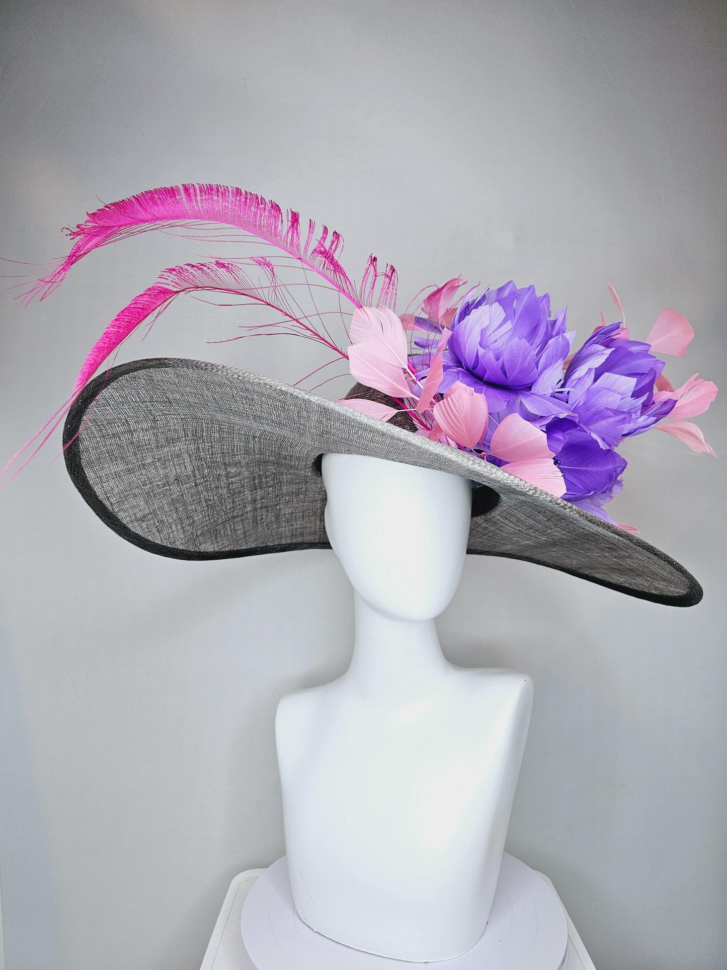 kentucky derby gray sinamay large wide brim hat with purple feather flowers and branching light pink feathers with hot pink long feathers