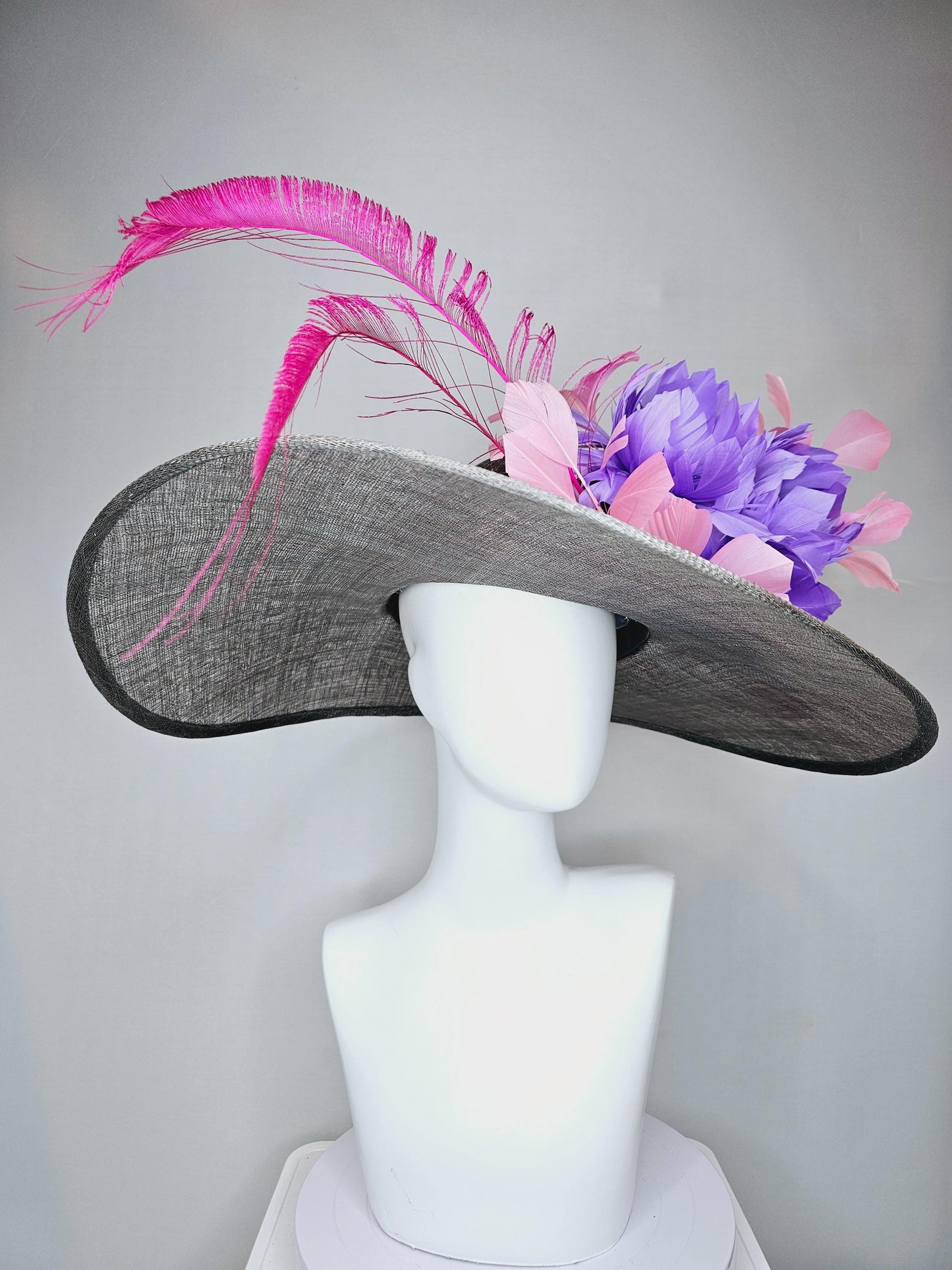 kentucky derby gray sinamay large wide brim hat with purple feather flowers and branching light pink feathers with hot pink long feathers