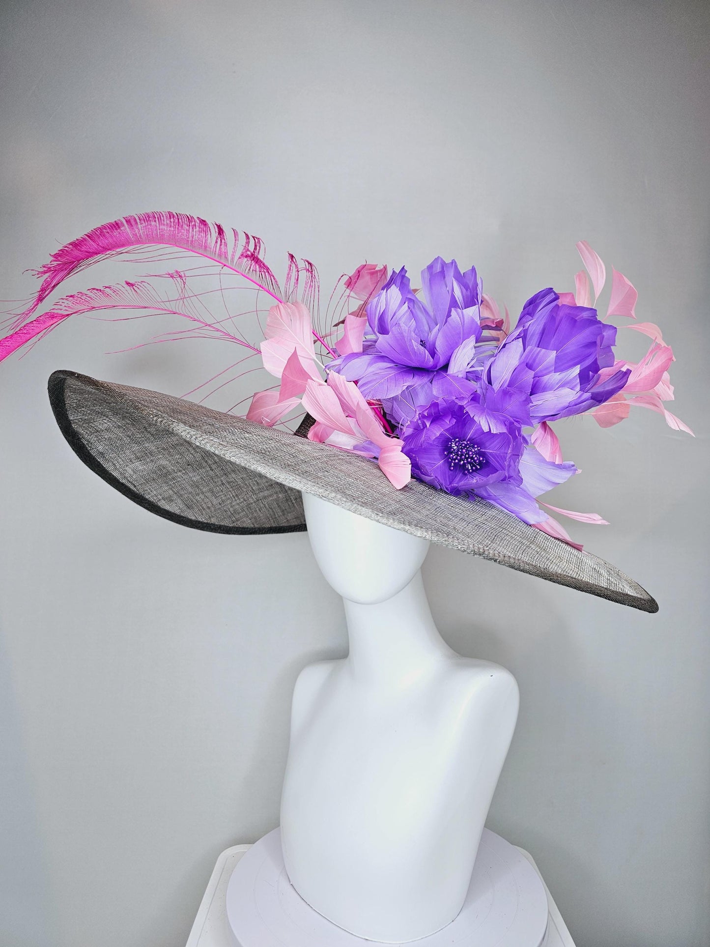 kentucky derby gray sinamay large wide brim hat with purple feather flowers and branching light pink feathers with hot pink long feathers
