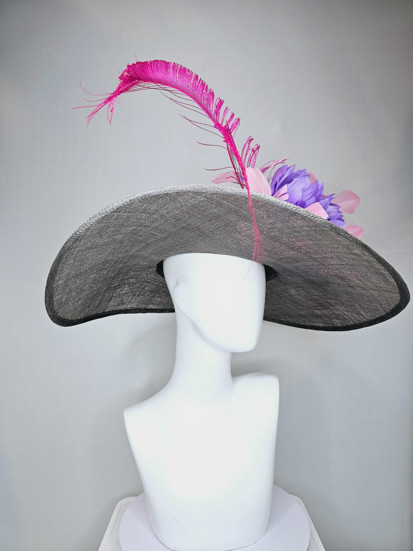 kentucky derby gray sinamay large wide brim hat with purple feather flowers and branching light pink feathers with hot pink long feathers