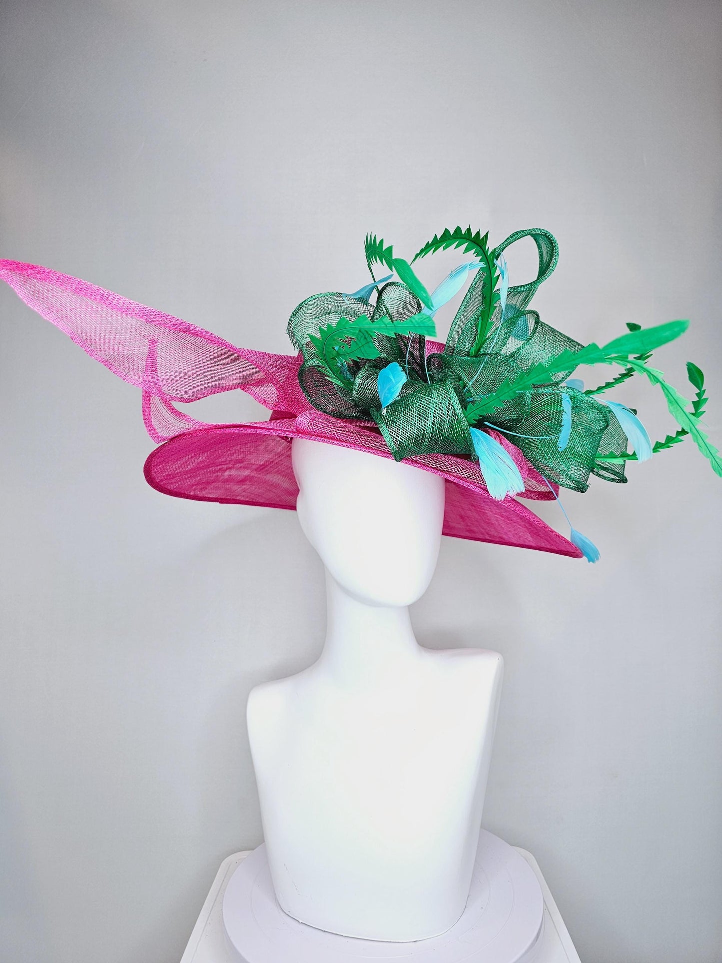 kentucky derby hat large wide brim sinamay hot pink hat with emerald green sinamay bow, green and sky light blue branching feathers