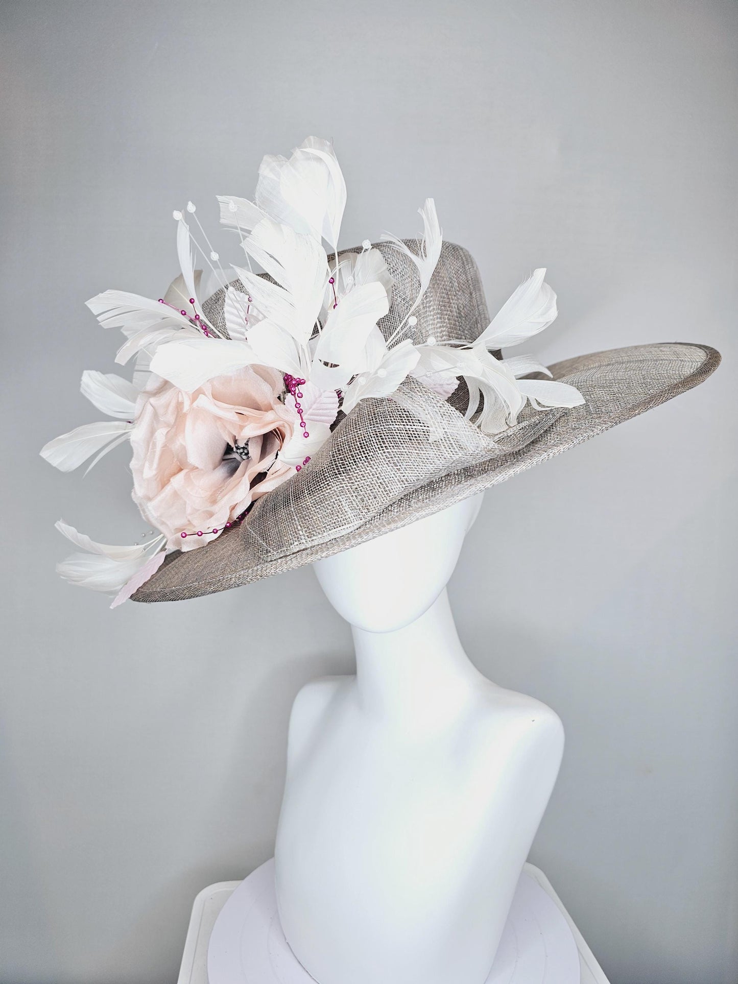 kentucky derby hat large wide brim sinamay gray hat with large white champagne pink silk flower and white branching feathers