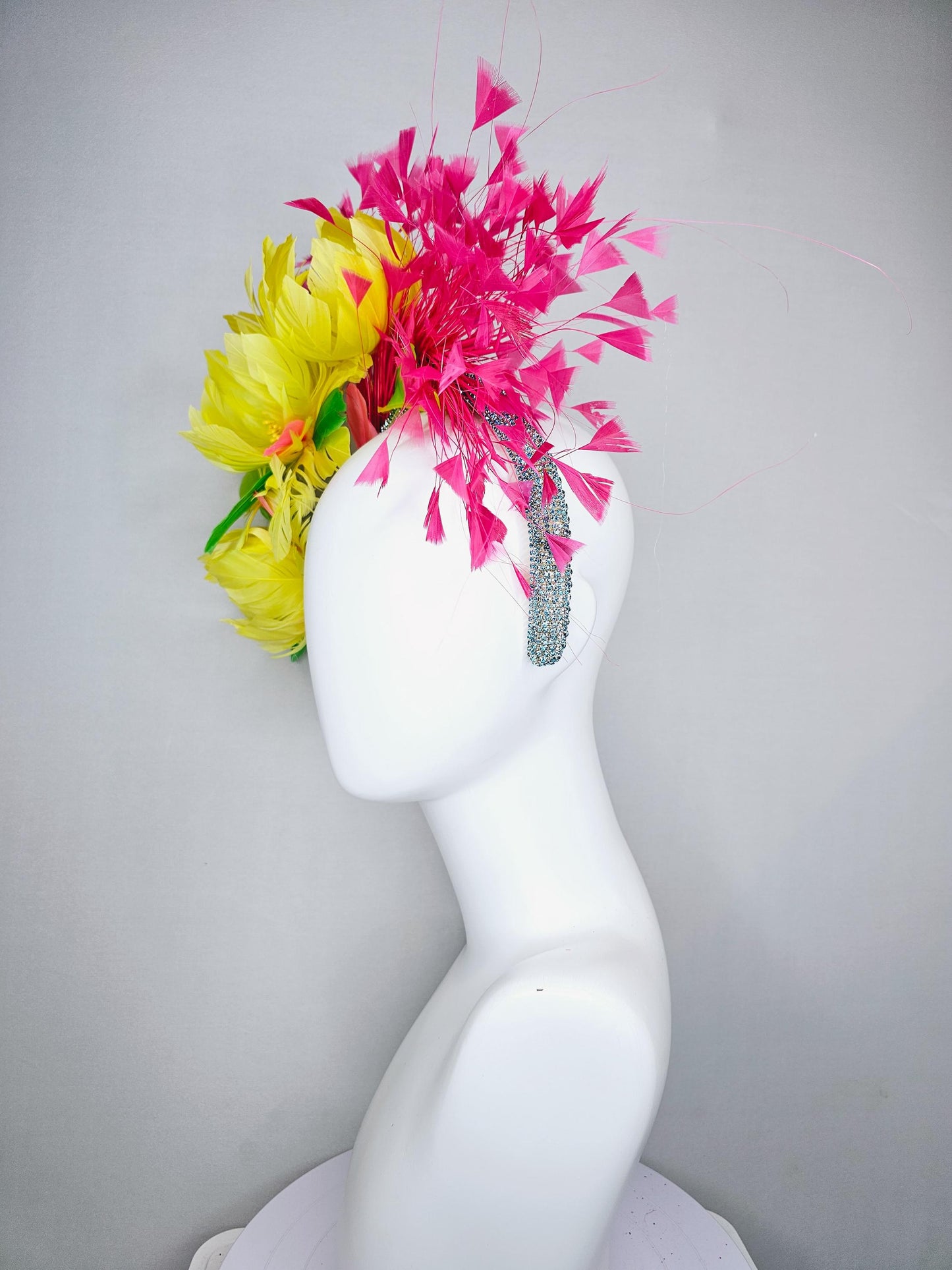 kentucky derby hat fascinator yellow feather flowers,green feather leaves,fuchsia pink branching feathers,sky blue rhinestone headband