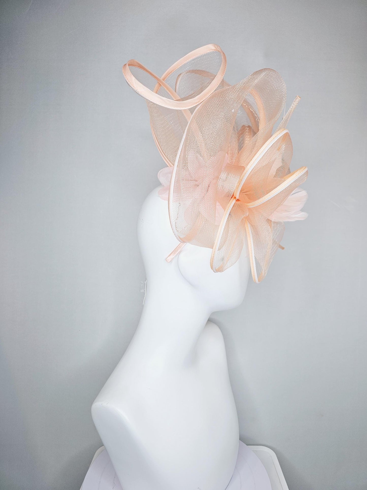kentucky derby hat fascinator with light blush pink mesh and wired ribbon large bendable decor with light blush pink branching feathers