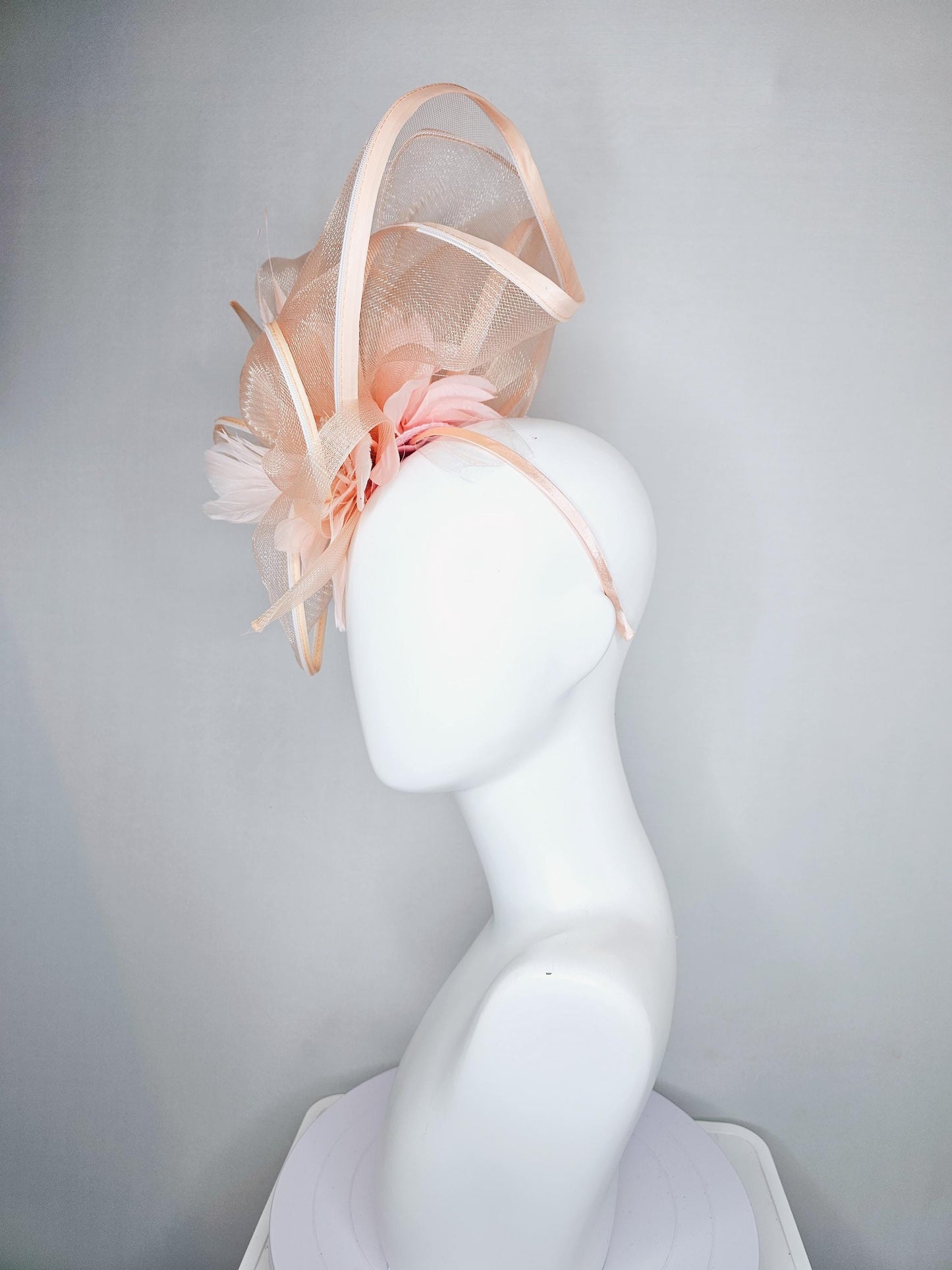 kentucky derby hat fascinator with light blush pink mesh and wired ribbon large bendable decor with light blush pink branching feathers