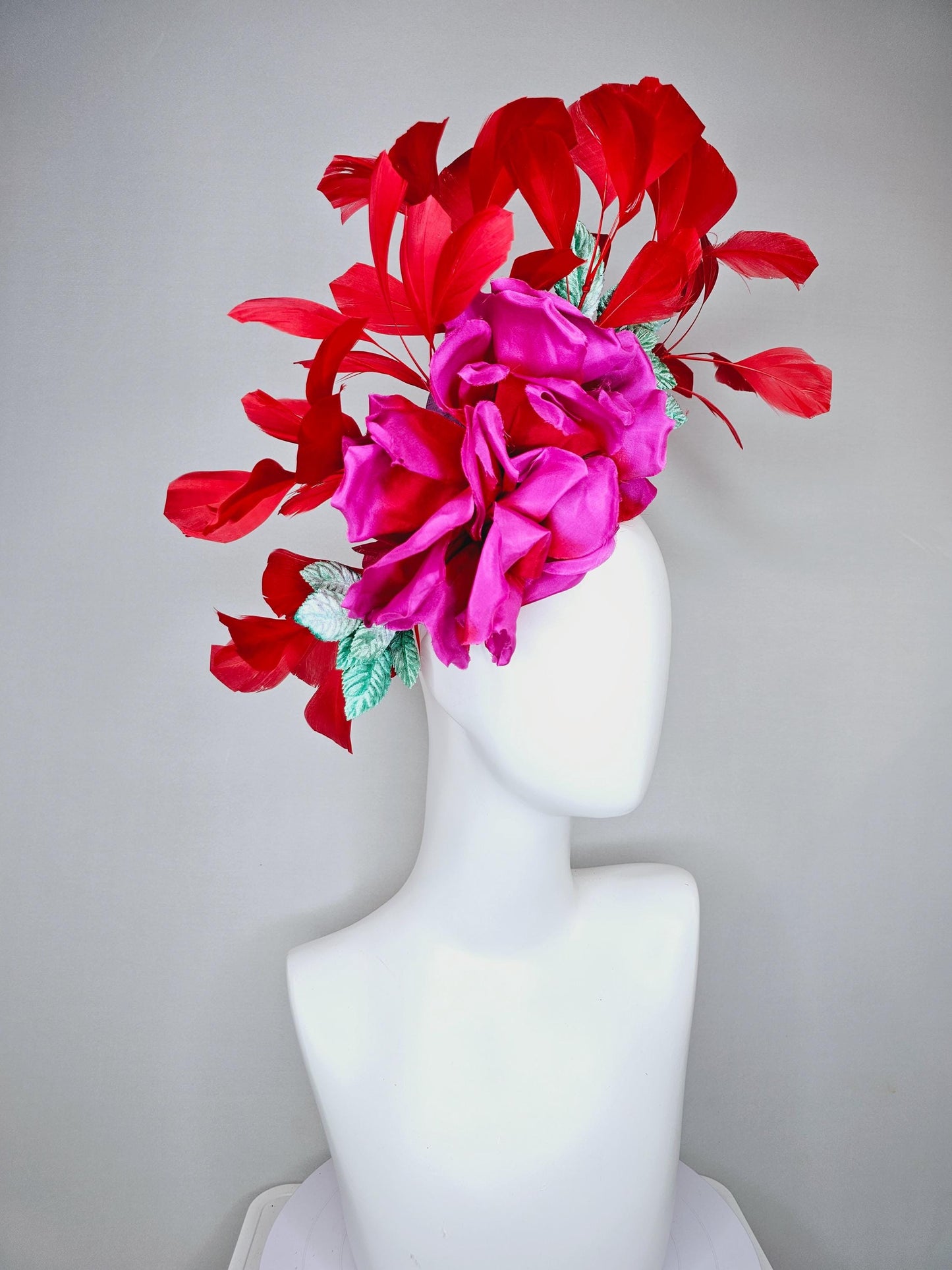 kentucky derby hat fascinator bright pink satin silk flower with aqua blue satin leaves and red coral branching feathers