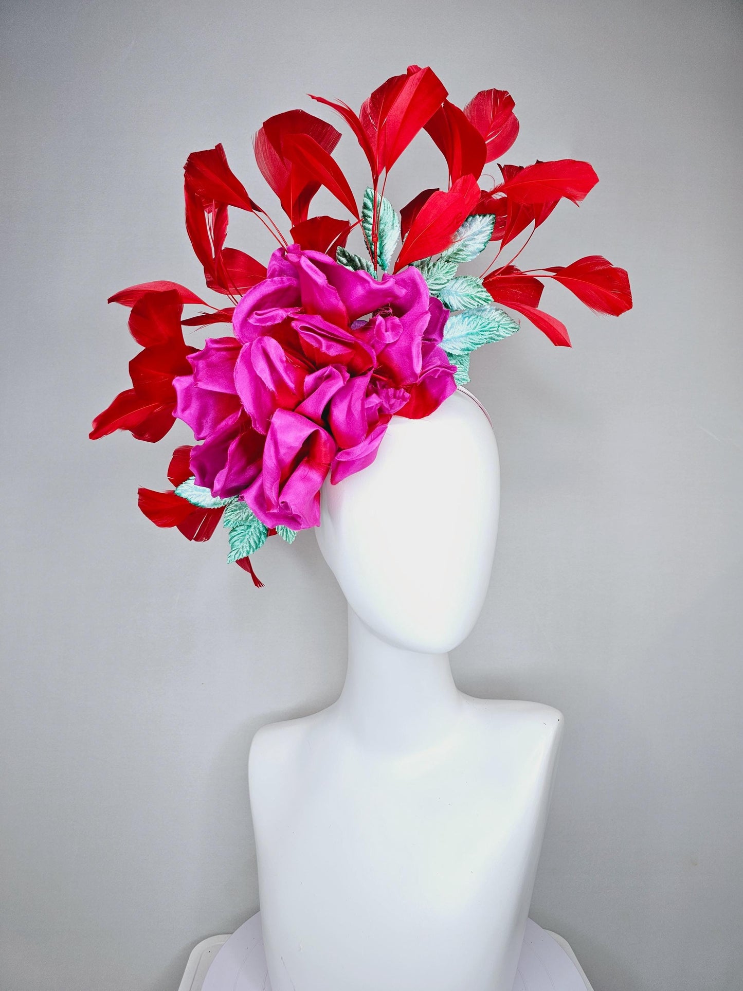 kentucky derby hat fascinator bright pink satin silk flower with aqua blue satin leaves and red coral branching feathers
