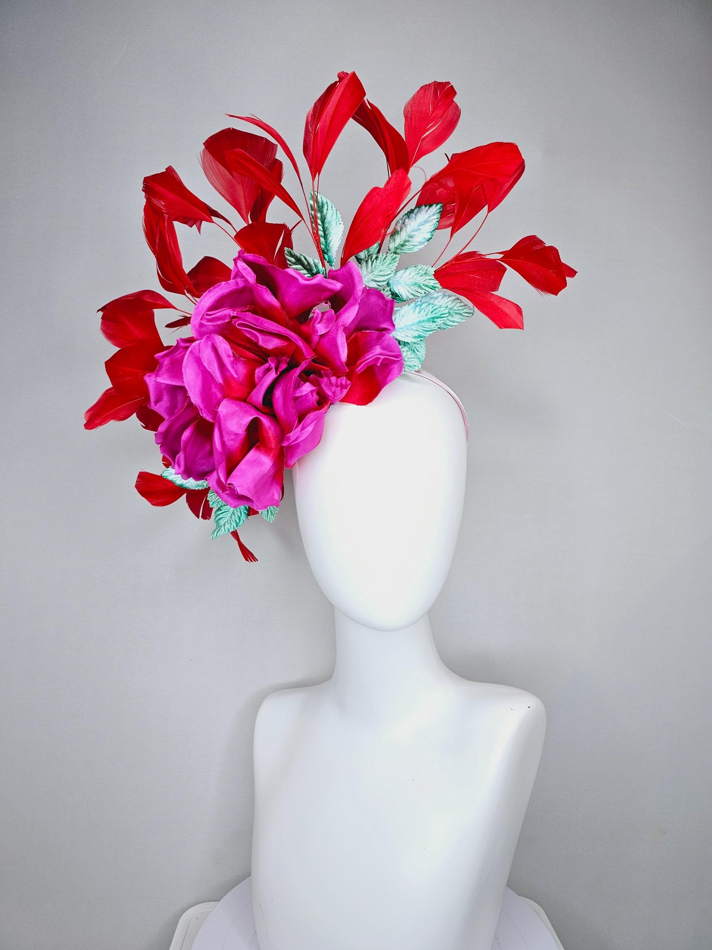 kentucky derby hat fascinator bright pink satin silk flower with aqua blue satin leaves and red coral branching feathers