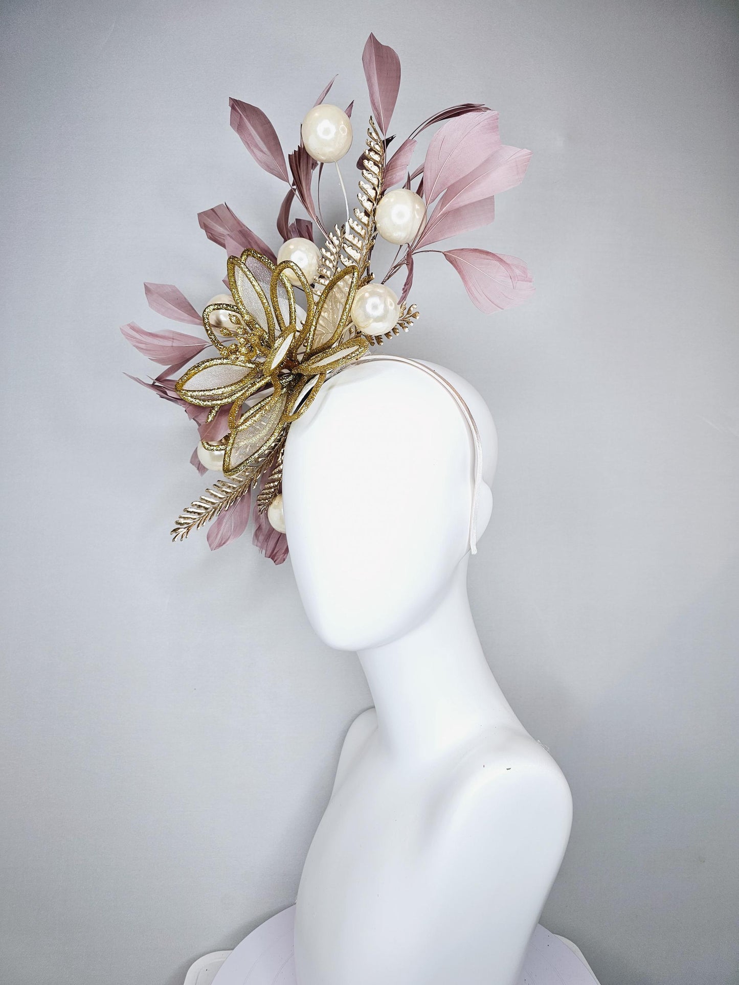 kentucky derby hat fascinator gold glitter flower with gold leaves, taupe brown branching feathers with pearls