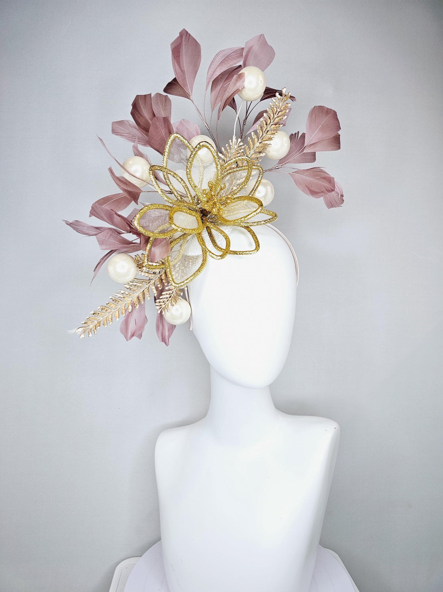 kentucky derby hat fascinator gold glitter flower with gold leaves, taupe brown branching feathers with pearls