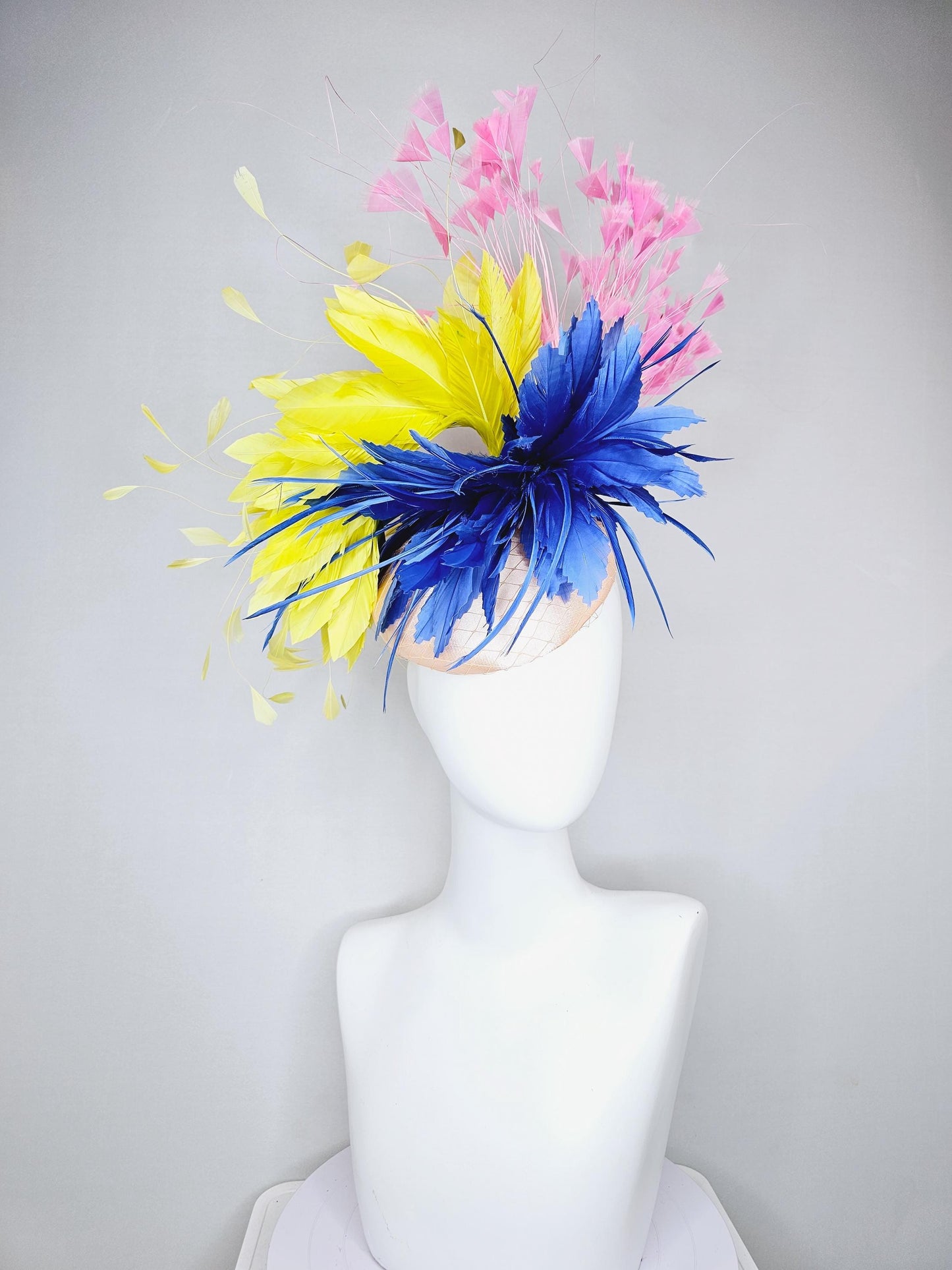 kentucky derby hat fascinator champagne satin with netting,cobalt royal blue and yellow feather flower, light blush pink branching feathers