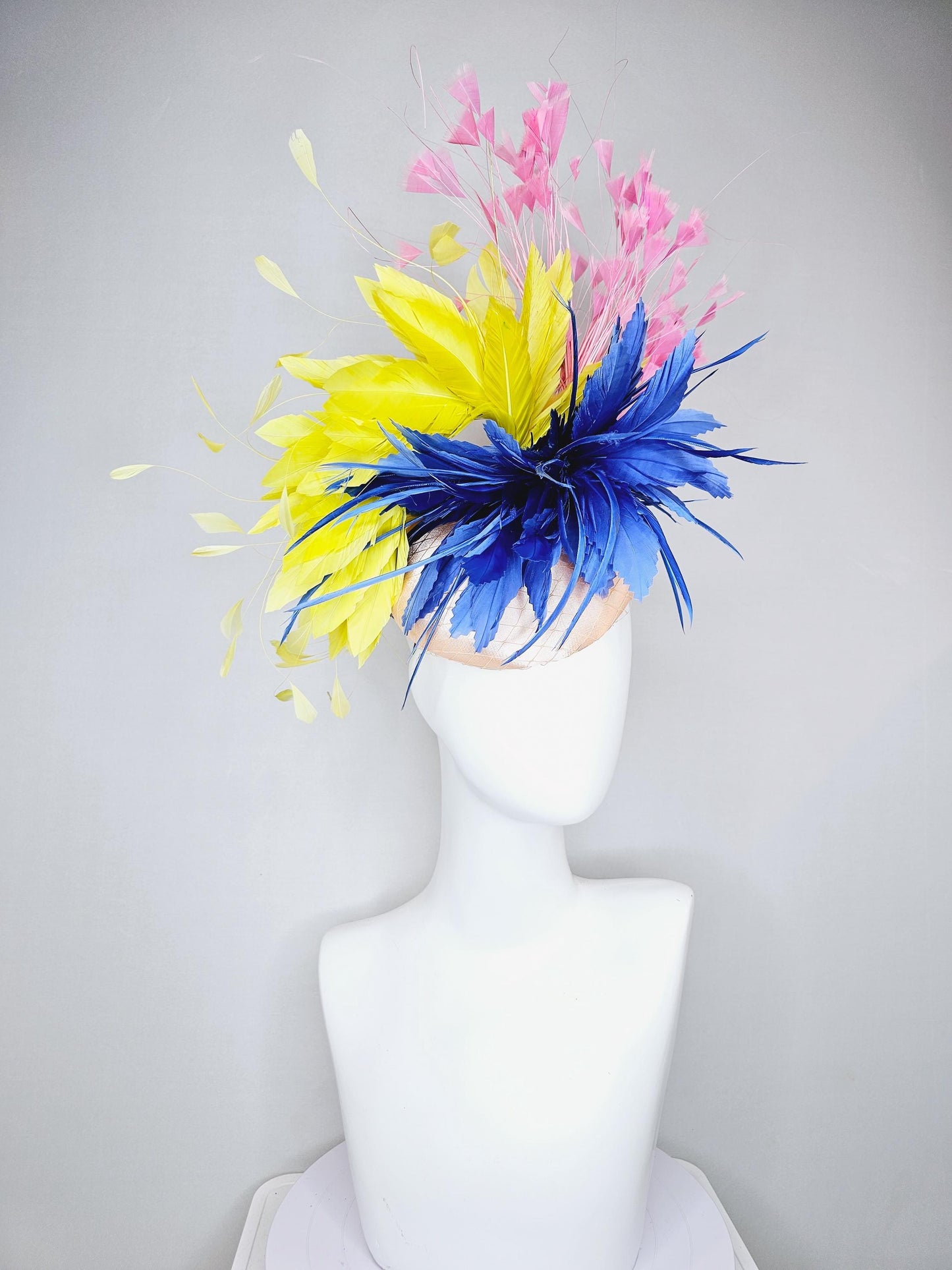 kentucky derby hat fascinator champagne satin with netting,cobalt royal blue and yellow feather flower, light blush pink branching feathers