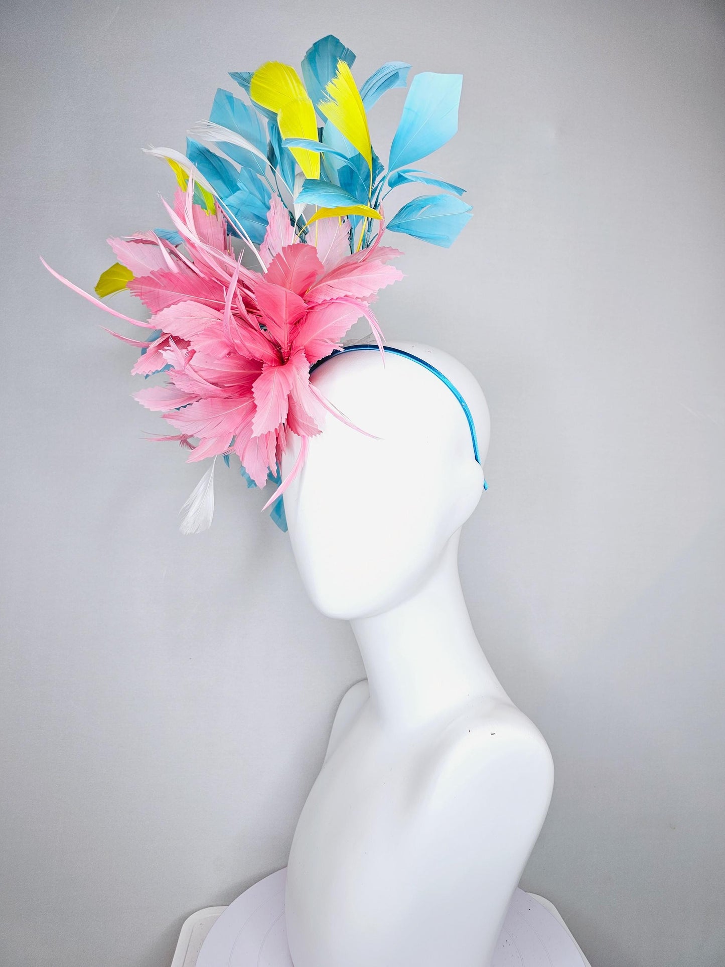 kentucky derby hat fascinator light blush pink rose feather flower, light turquoise aqua blue yellow white branching feathers, thin headband