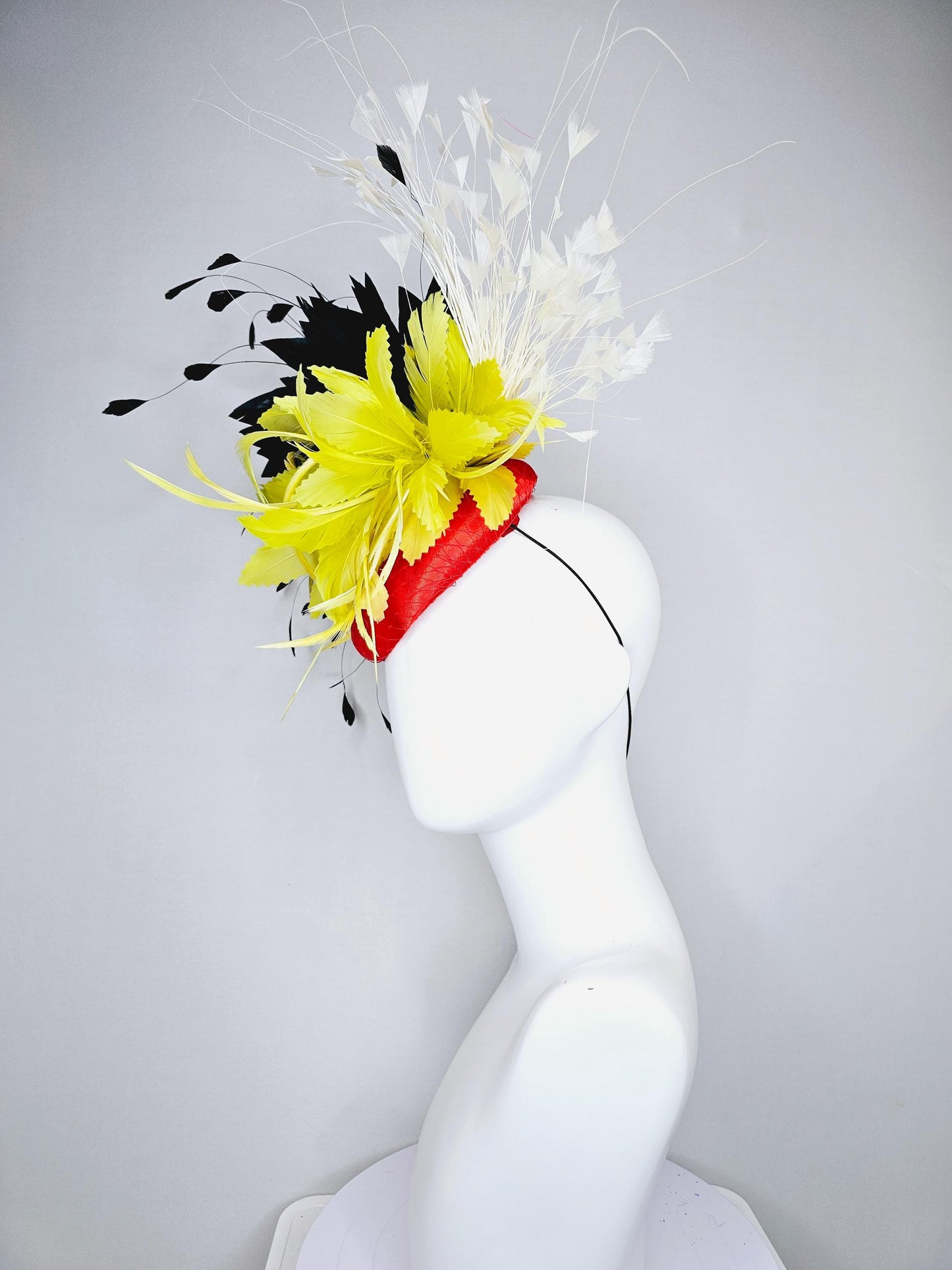 kentucky derby hat fascinator red satin with netting, yellow and black feather flower, white ivory branching feathers