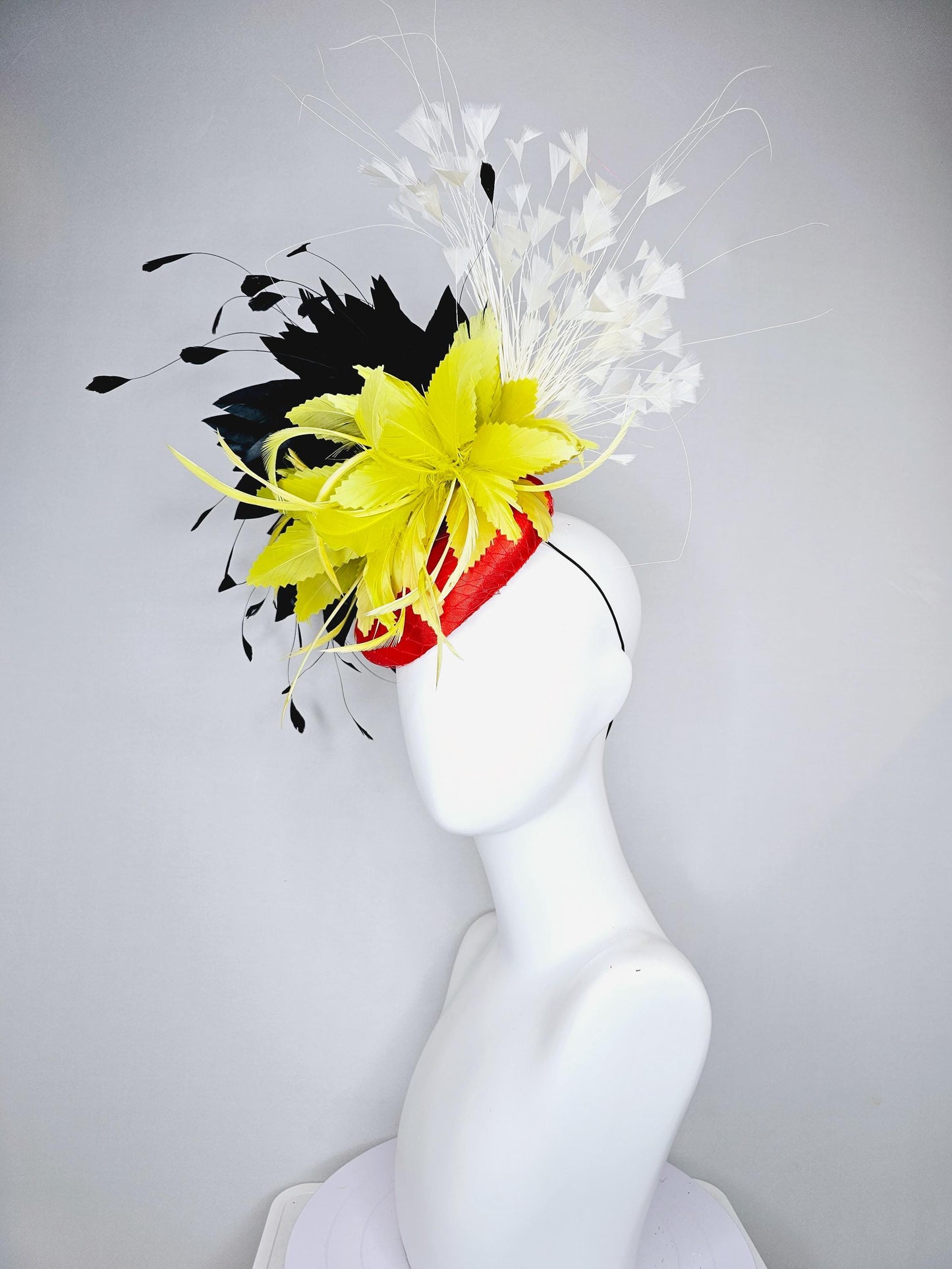 kentucky derby hat fascinator red satin with netting, yellow and black feather flower, white ivory branching feathers
