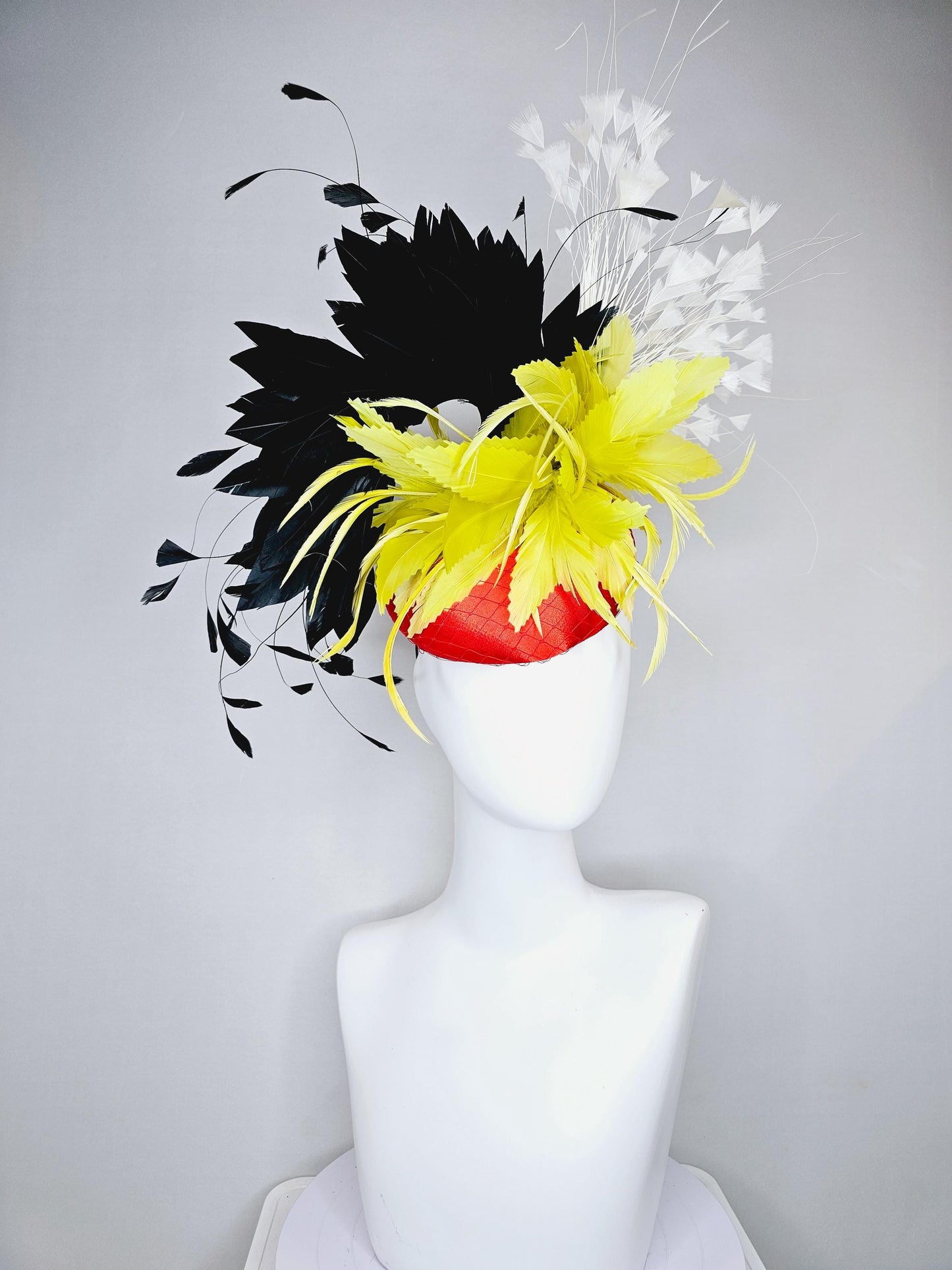 kentucky derby hat fascinator red satin with netting, yellow and black feather flower, white ivory branching feathers