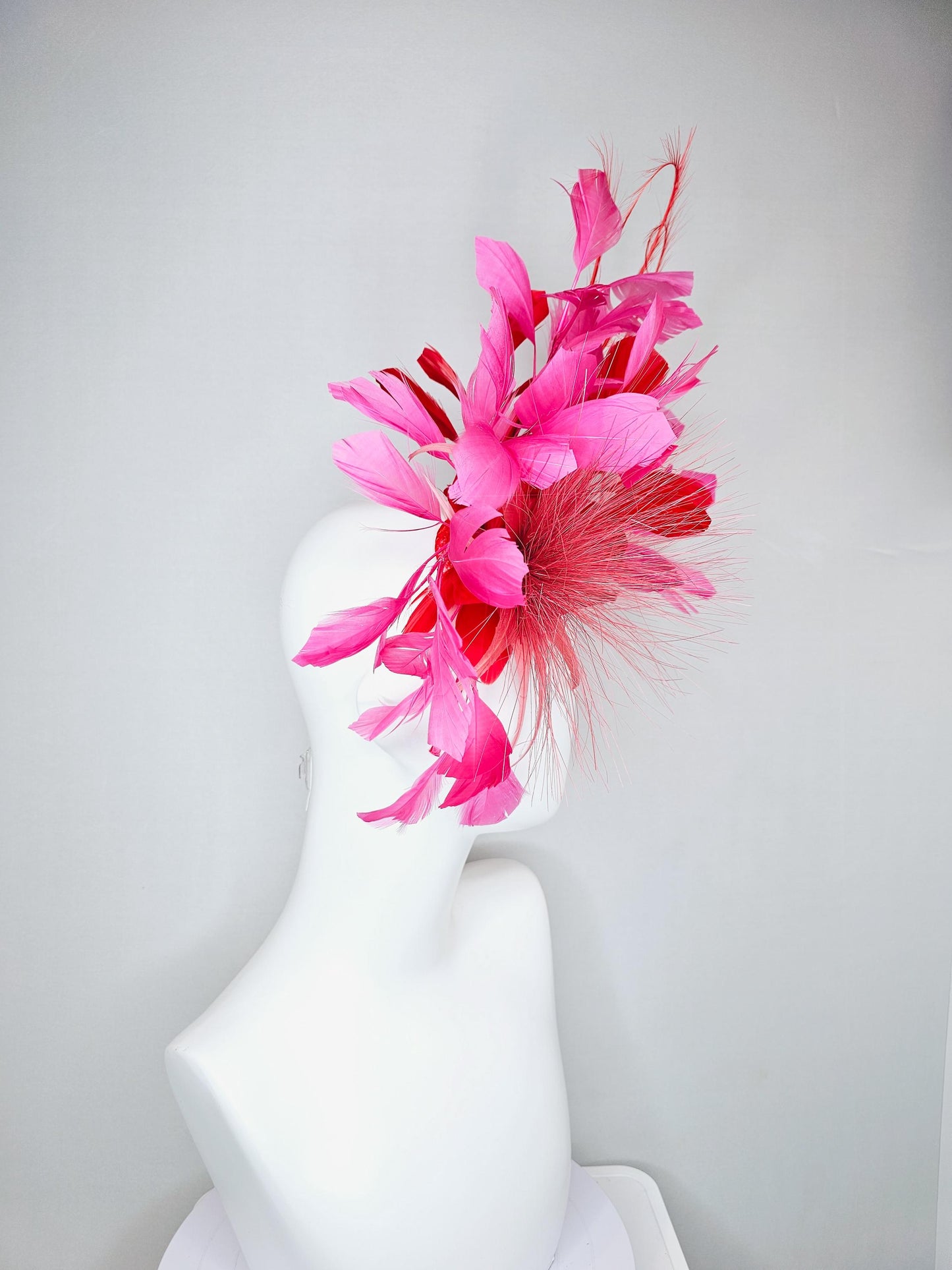 kentucky derby hat fascinator light red spiky feather flower, cherry scarlet red and pink branching feathers and light red feather curls