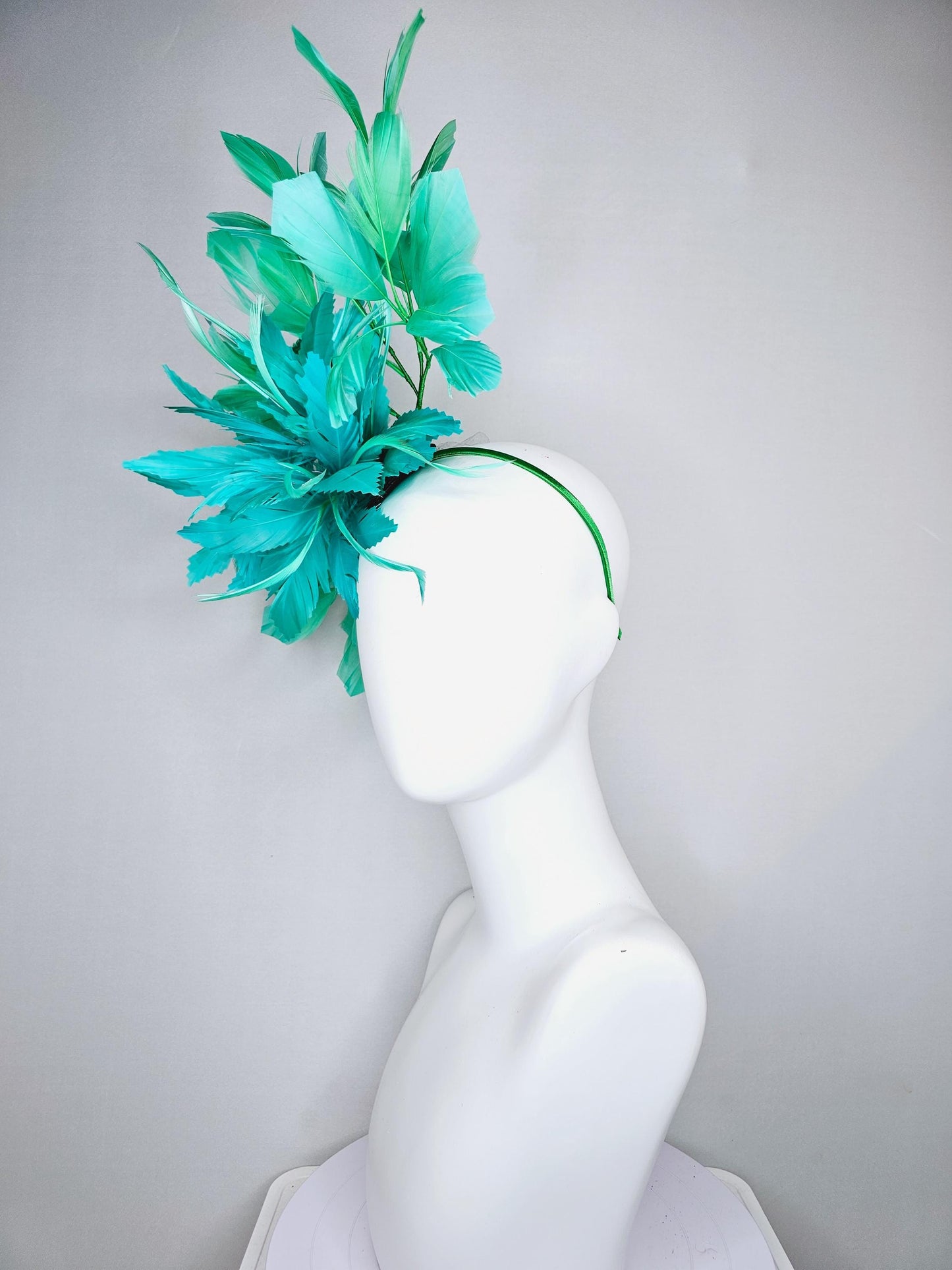 kentucky derby hat fascinator aqua green turquoise feather flower with green branching feathers, thin headband