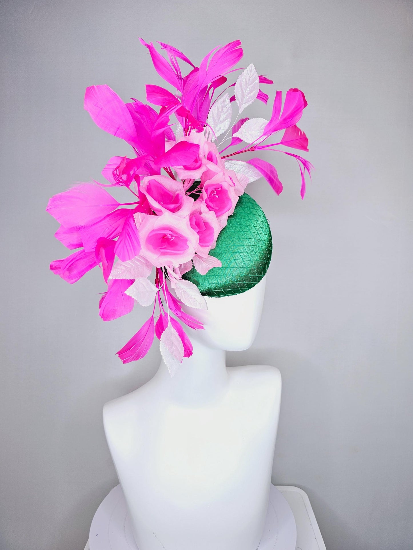 kentucky derby hat fascinator green satin with netting, blush pink satin flowers, light pink leaves, bright pink fuchsia branching feathers