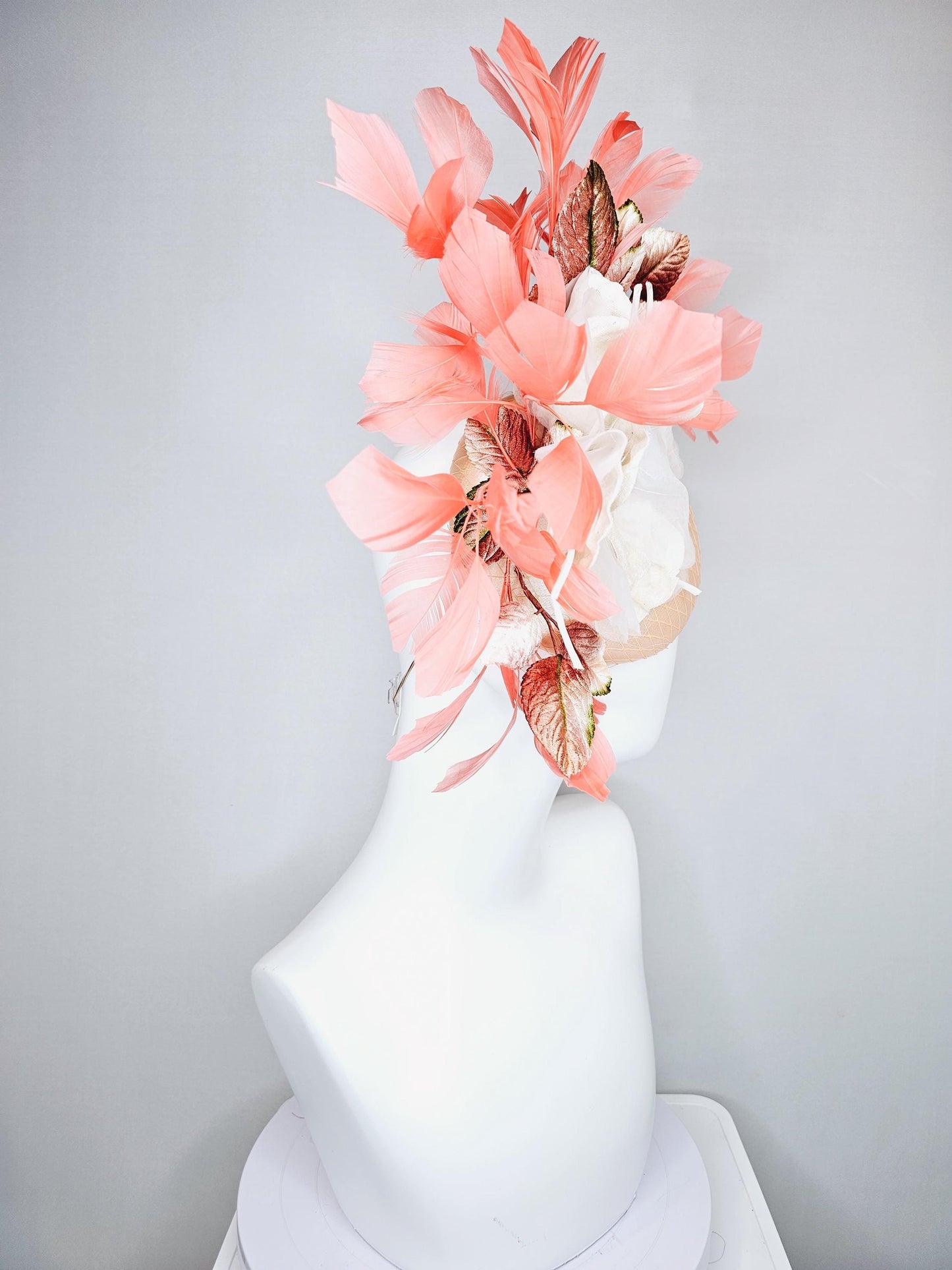 kentucky derby hat fascinator neutral beige satin with netting, white organza flowers, orange ombre leaves, orange peach branching feathers