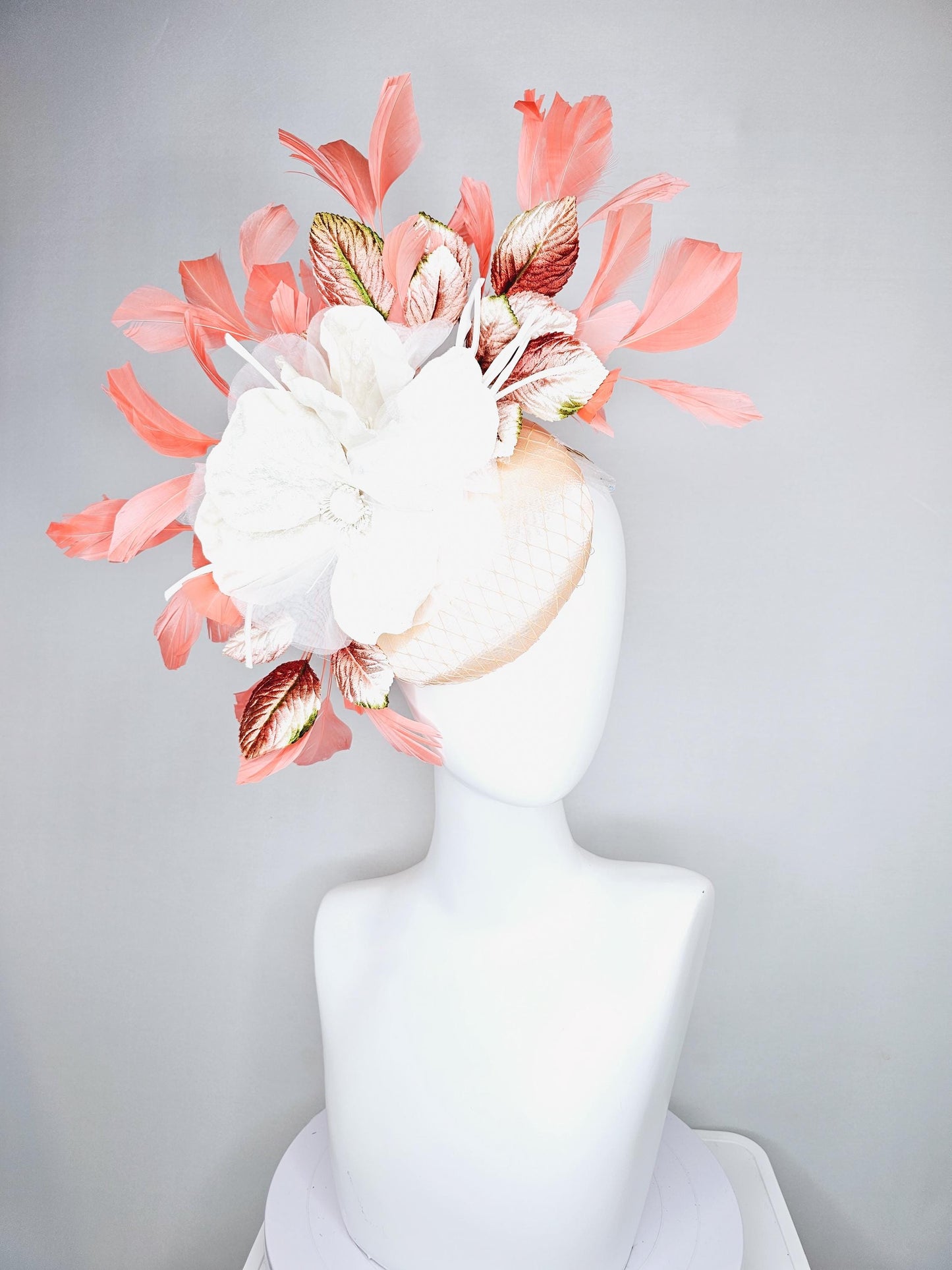 kentucky derby hat fascinator neutral beige satin with netting, white organza flowers, orange ombre leaves, orange peach branching feathers