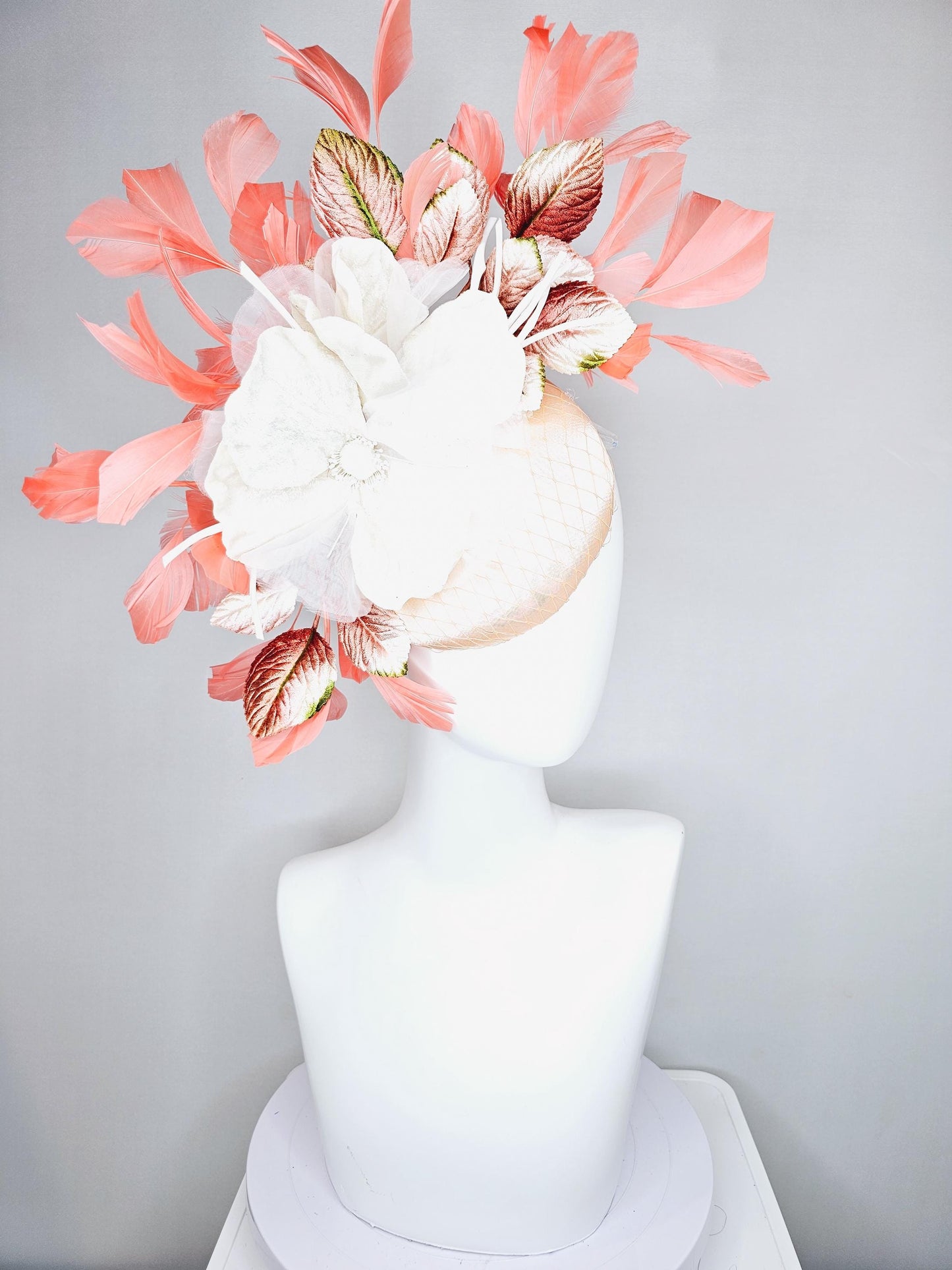 kentucky derby hat fascinator neutral beige satin with netting, white organza flowers, orange ombre leaves, orange peach branching feathers