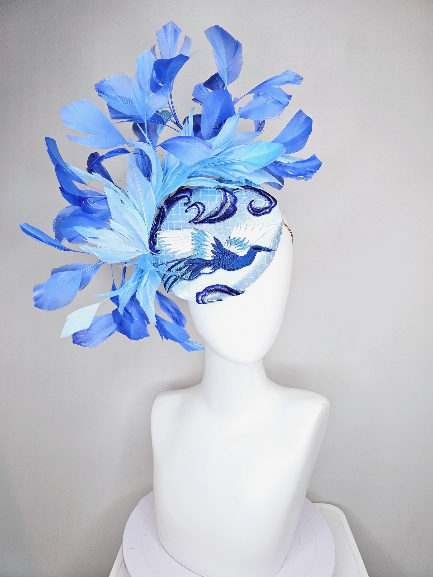 kentucky derby hat fascinator light blue satin with netting embroidered white blue birds, sky blue royal blue cobalt blue branching feathers