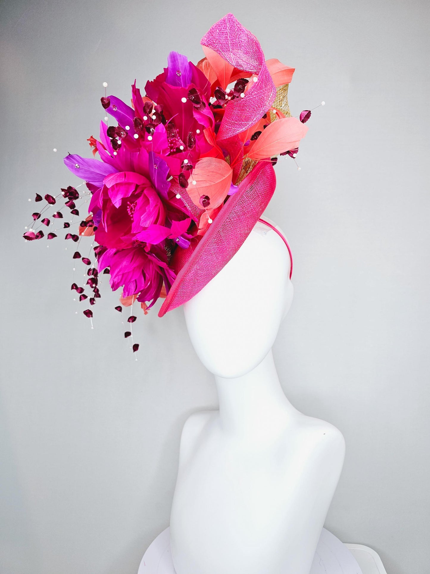 kentucky derby hat fascinator pink sinamay saucer,pink fuchsia feather flowers,pink purple orange branching feathers,pearl and floral stems