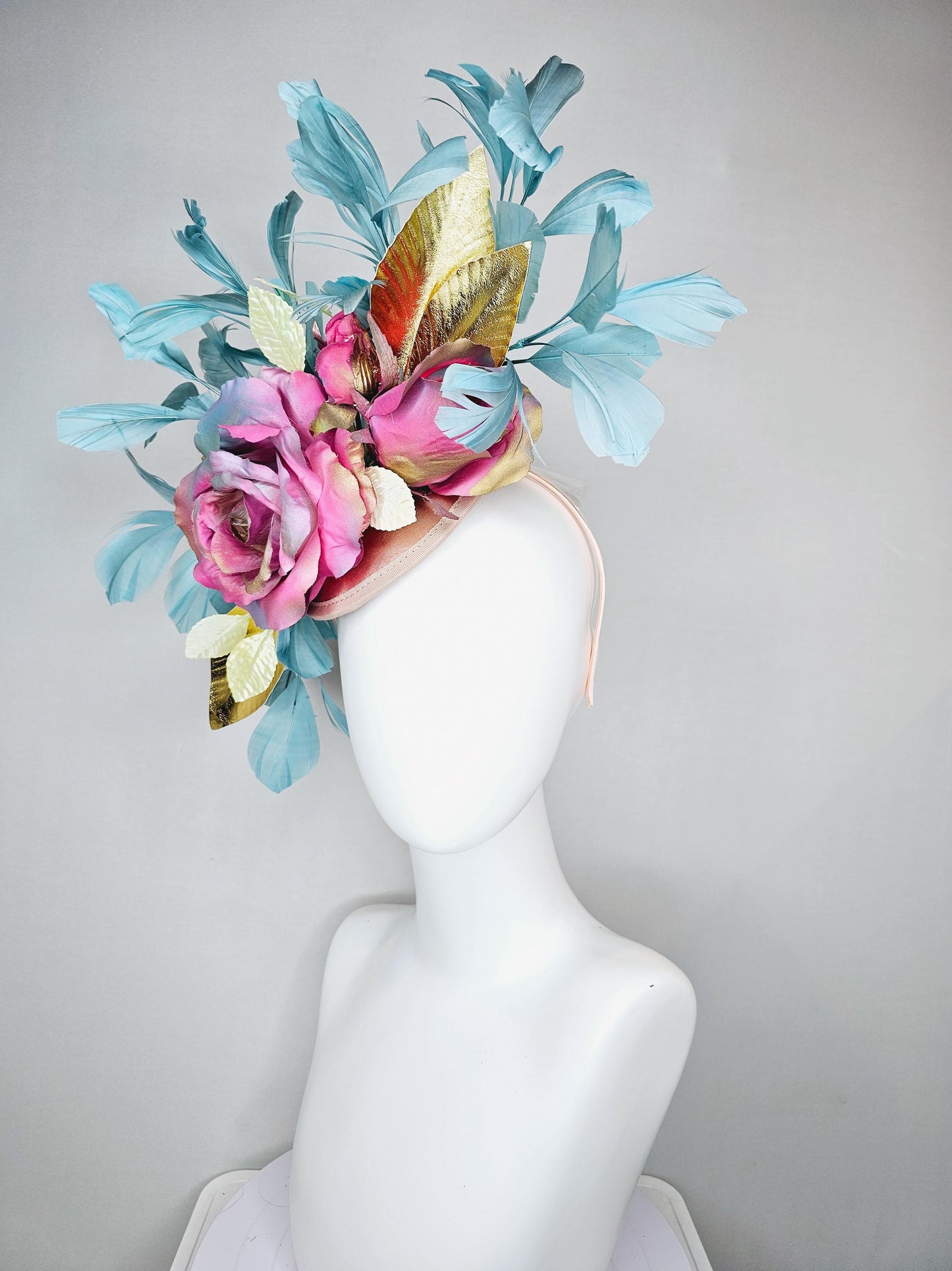kentucky derby hat fascinator champagne satin with rainbow pink gold teal blue rose flowers and gold leaves, teal blue feathers