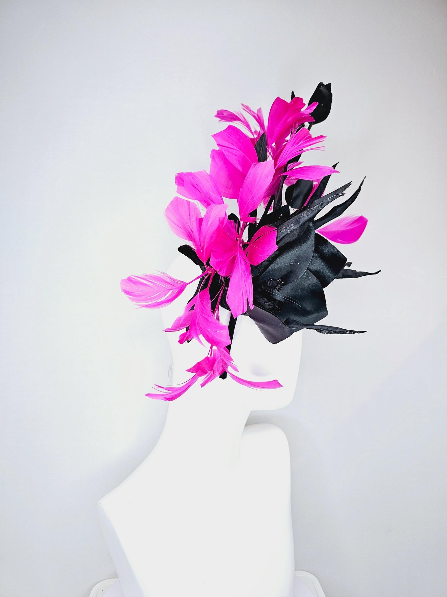 kentucky derby hat fascinator black sinamay with black satin silk flower and bright pink fuchsia branching feathers