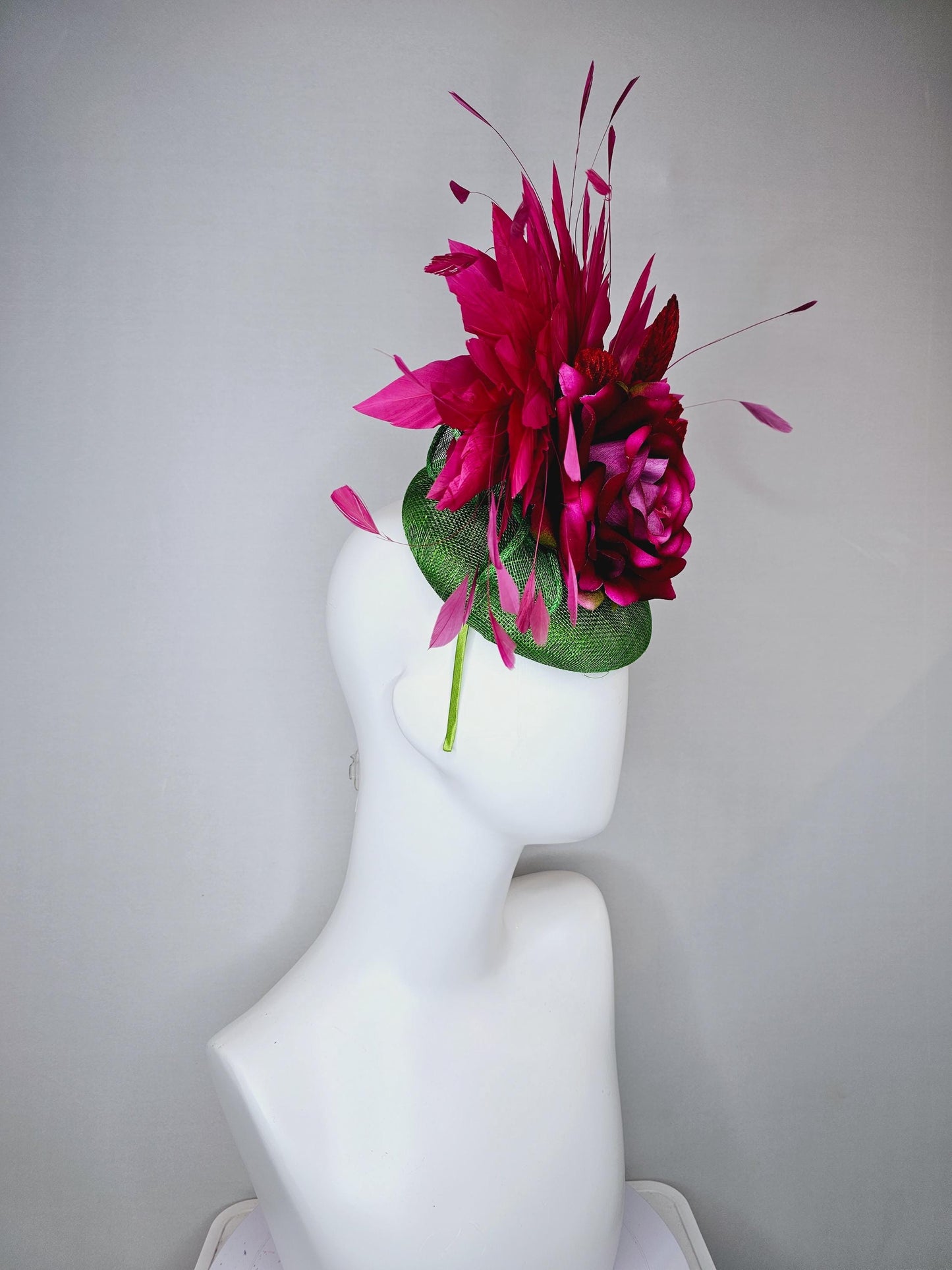 kentucky derby hat fascinator green sinamay with pink fuchsia satin silk rose flower and red leaves, pink branching feathers