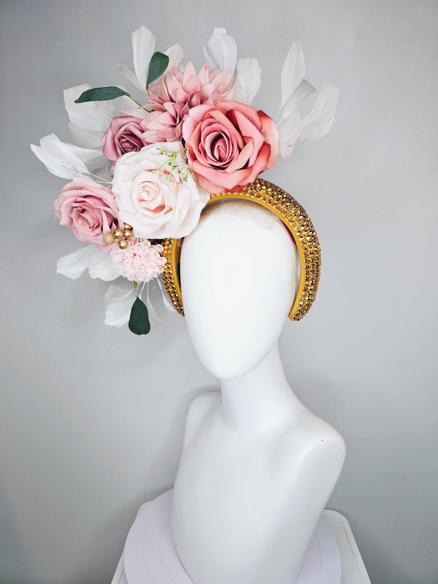 kentucky derby hat fascinator gold crystal headband, light pink dusty pink satin flowers, green leaves, ivory white feathers