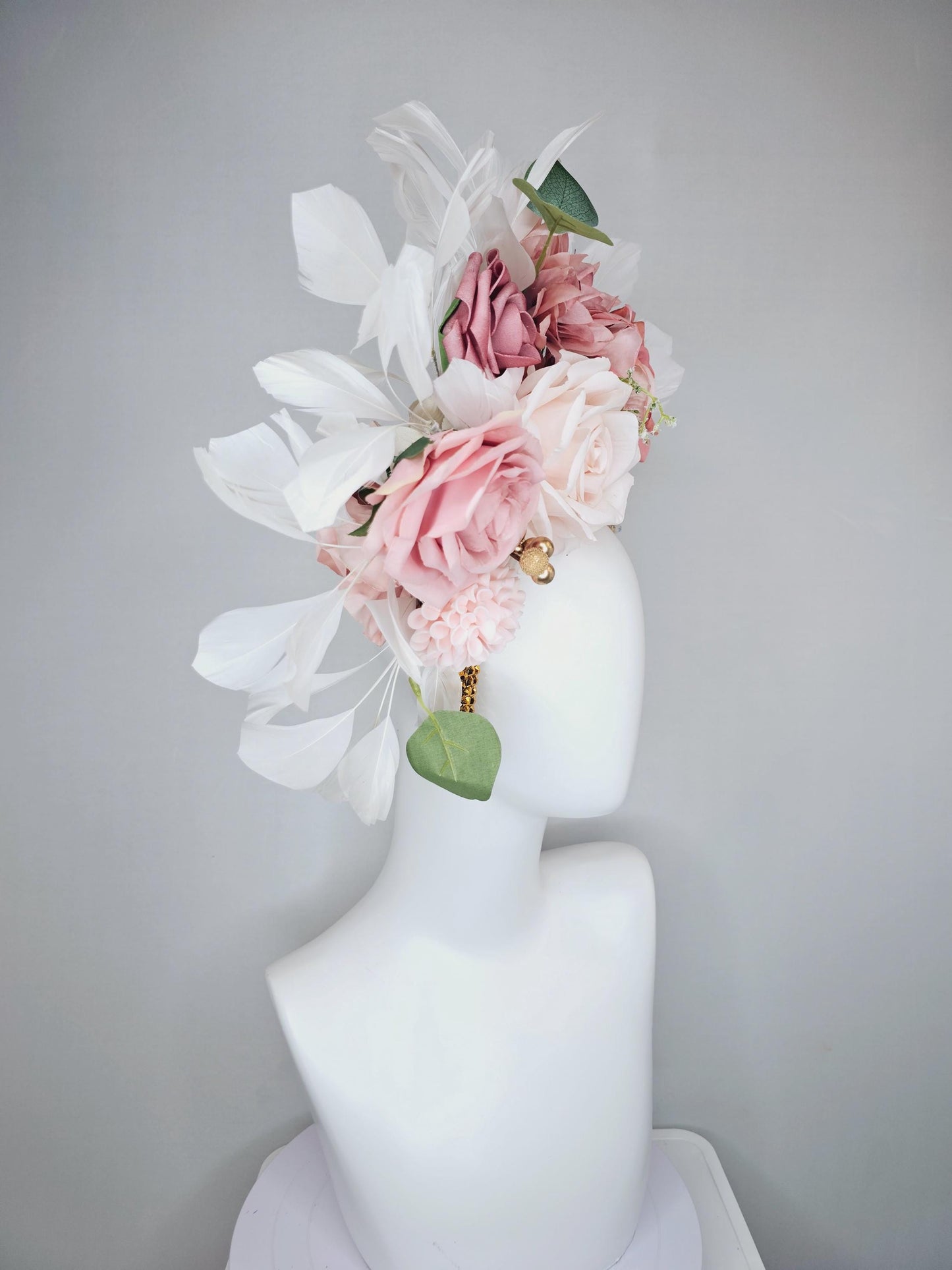 kentucky derby hat fascinator gold crystal headband, light pink dusty pink satin flowers, green leaves, ivory white feathers
