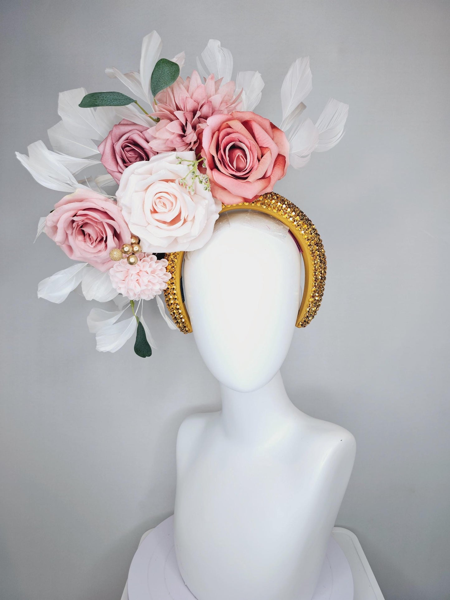kentucky derby hat fascinator gold crystal headband, light pink dusty pink satin flowers, green leaves, ivory white feathers