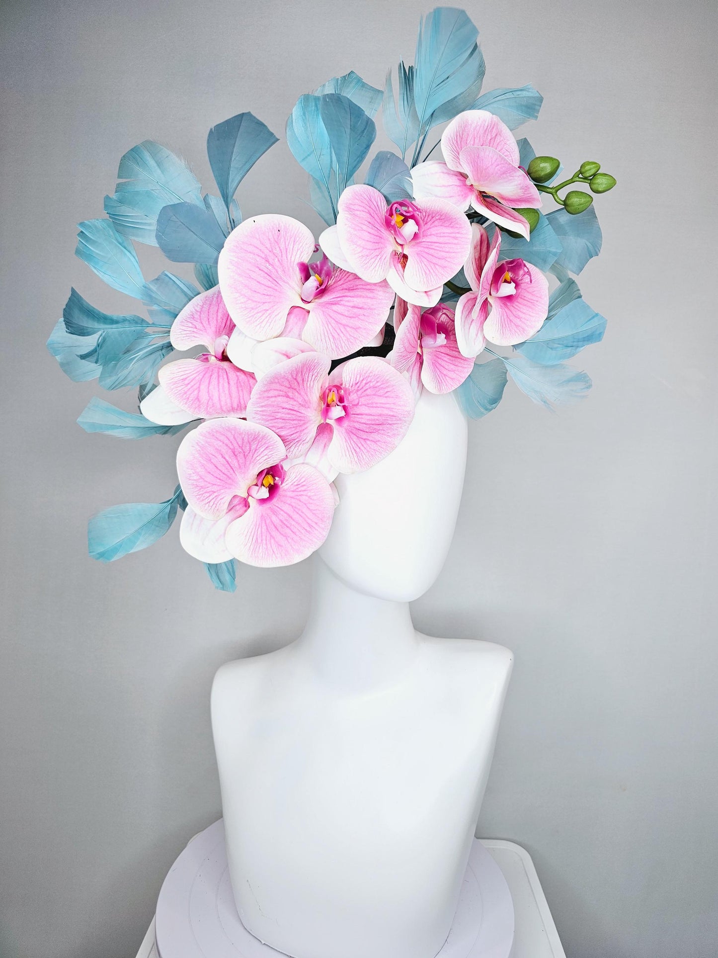 kentucky derby hat fascinator large white and blush pink orchid satin silk flowers, teal blue branching feathers