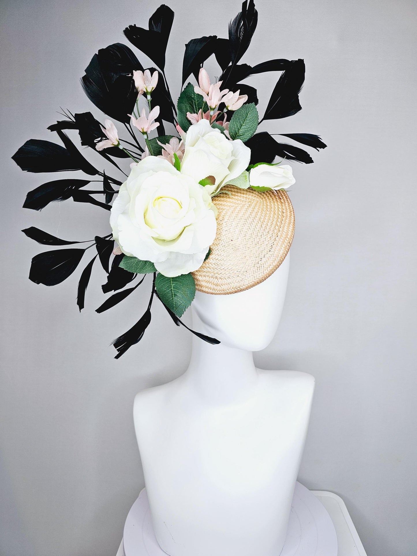 kentucky derby hat fascinator tan straw w/ neutral ivory white satin rose flowers,green leaves, light pink flowers, black branching feathers