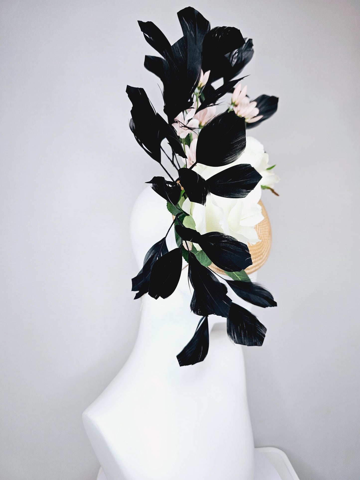 kentucky derby hat fascinator tan straw w/ neutral ivory white satin rose flowers,green leaves, light pink flowers, black branching feathers