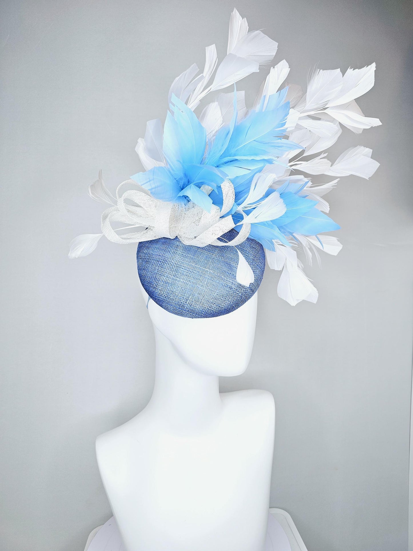 kentucky derby hat fascinator dark blue sinamay base with white sinamay bow, sky blue and white branching feathers