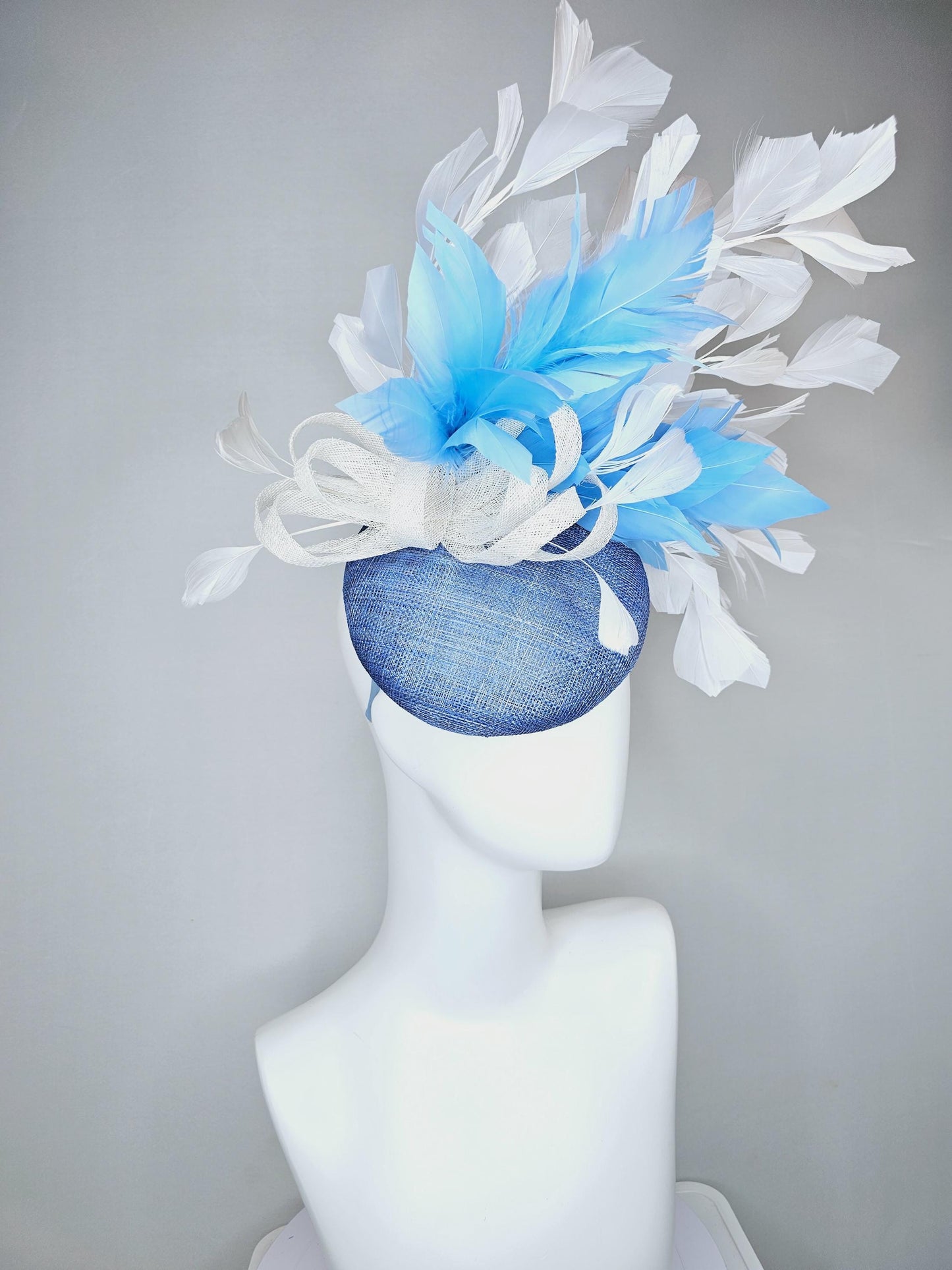 kentucky derby hat fascinator dark blue sinamay base with white sinamay bow, sky blue and white branching feathers