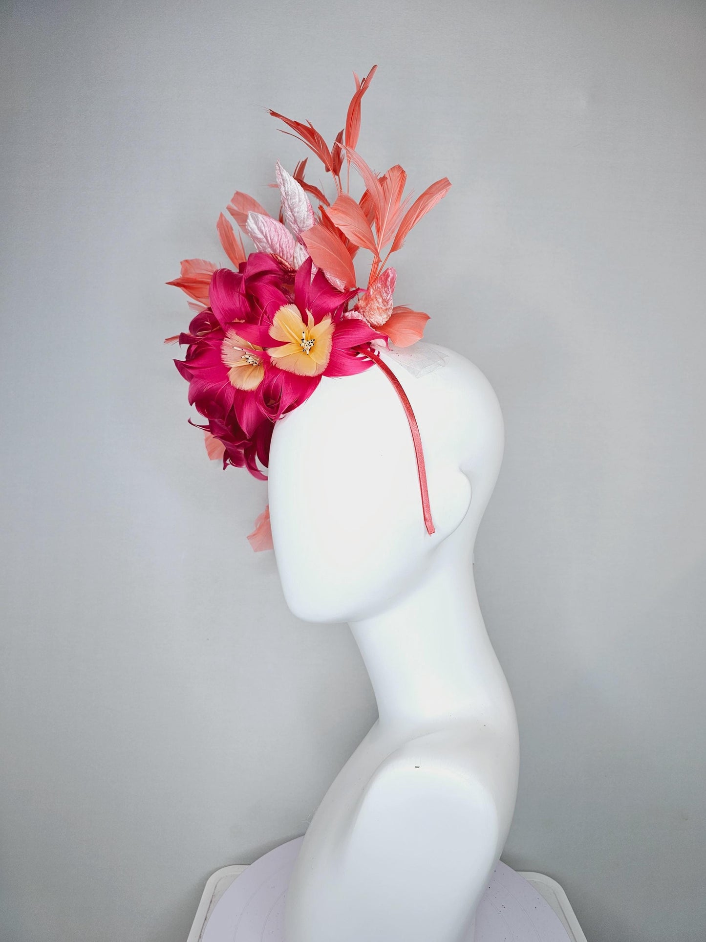 kentucky derby hat fascinator pink feather flowers with light blush pink leaves and coral orange feathers, thin headband
