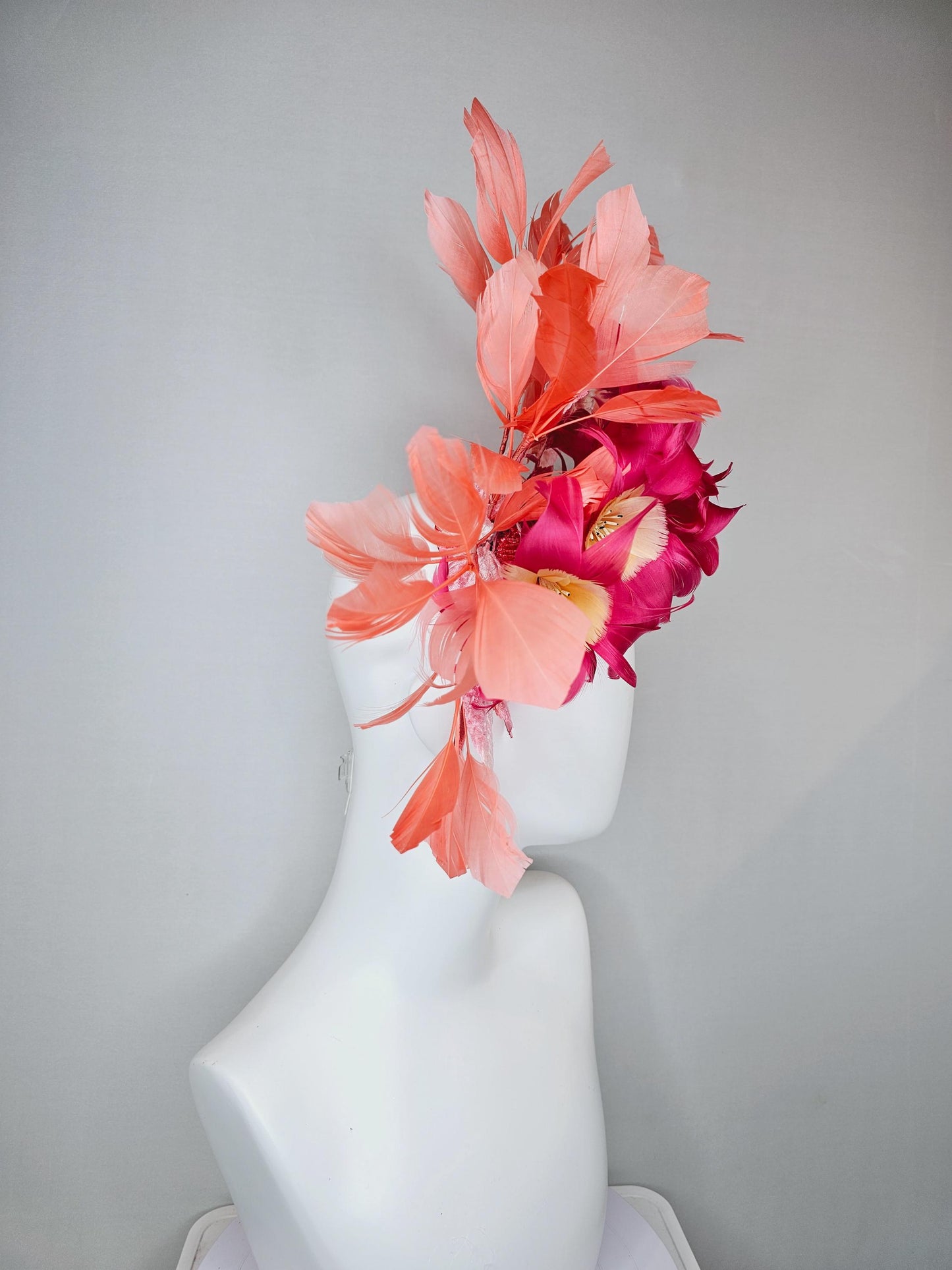 kentucky derby hat fascinator pink feather flowers with light blush pink leaves and coral orange feathers, thin headband