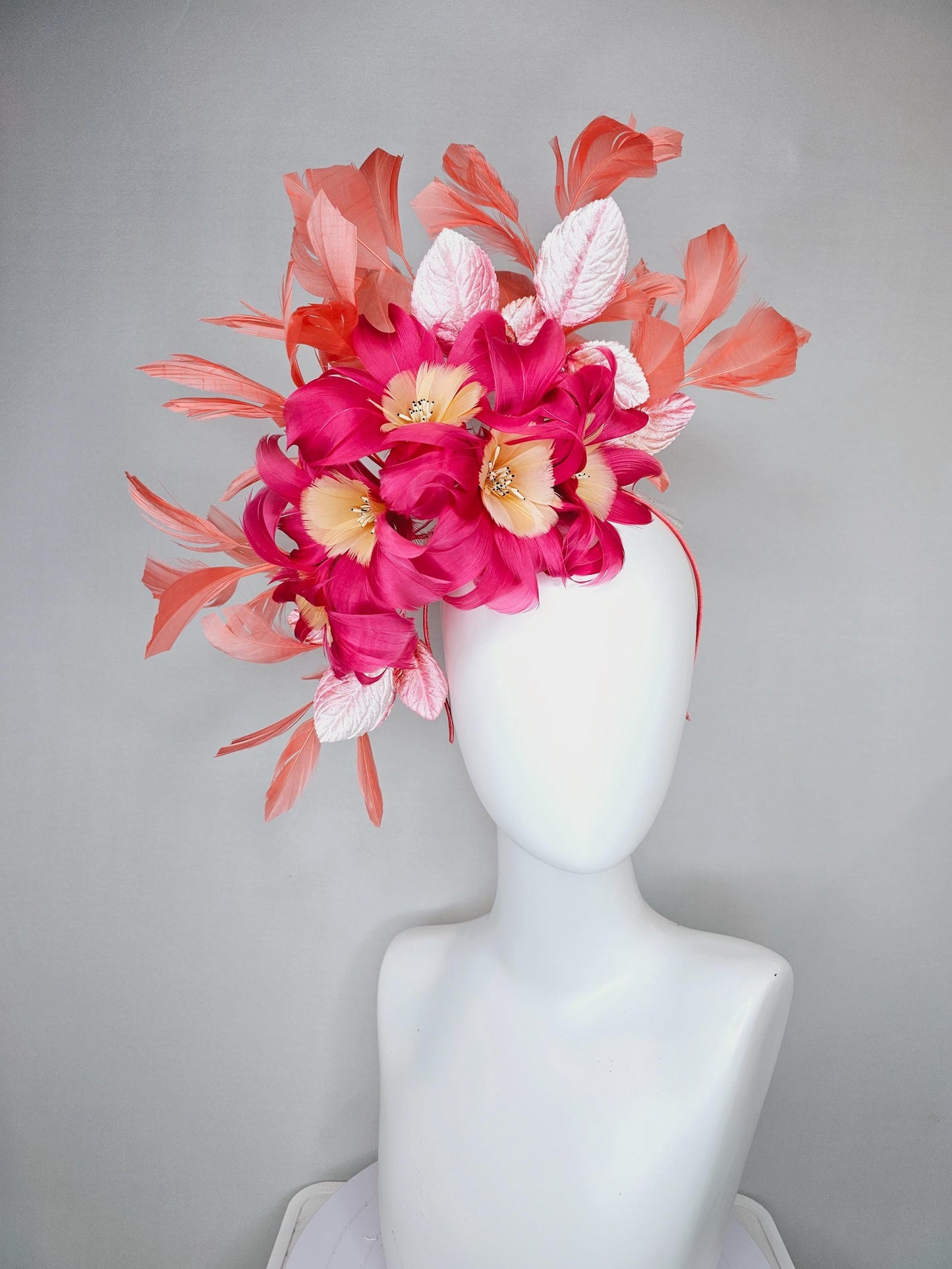 kentucky derby hat fascinator pink feather flowers with light blush pink leaves and coral orange feathers, thin headband