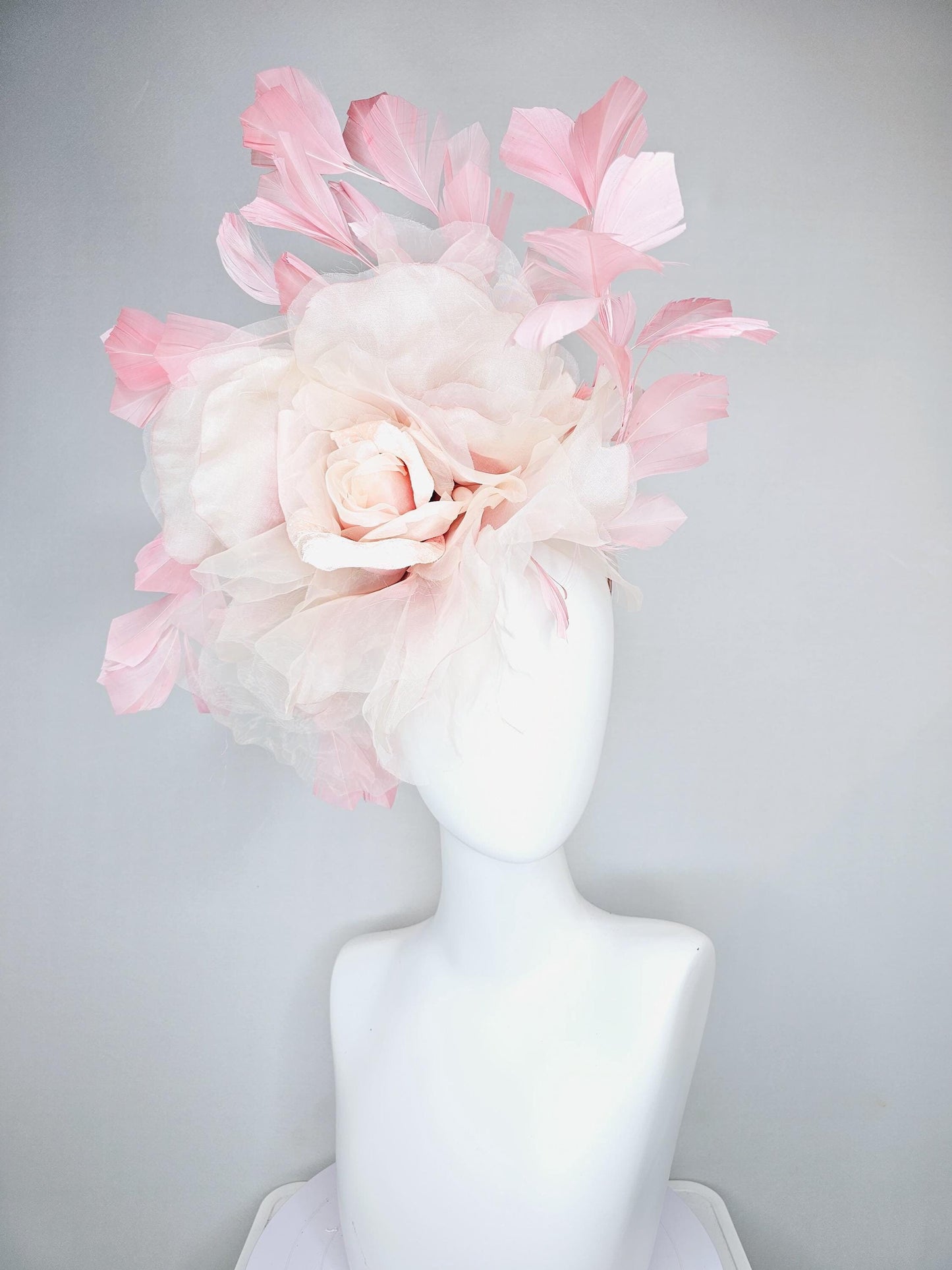 kentucky derby hat fascinator with light baby pink satin and organza rose flower and blush pink feathers, thin headband