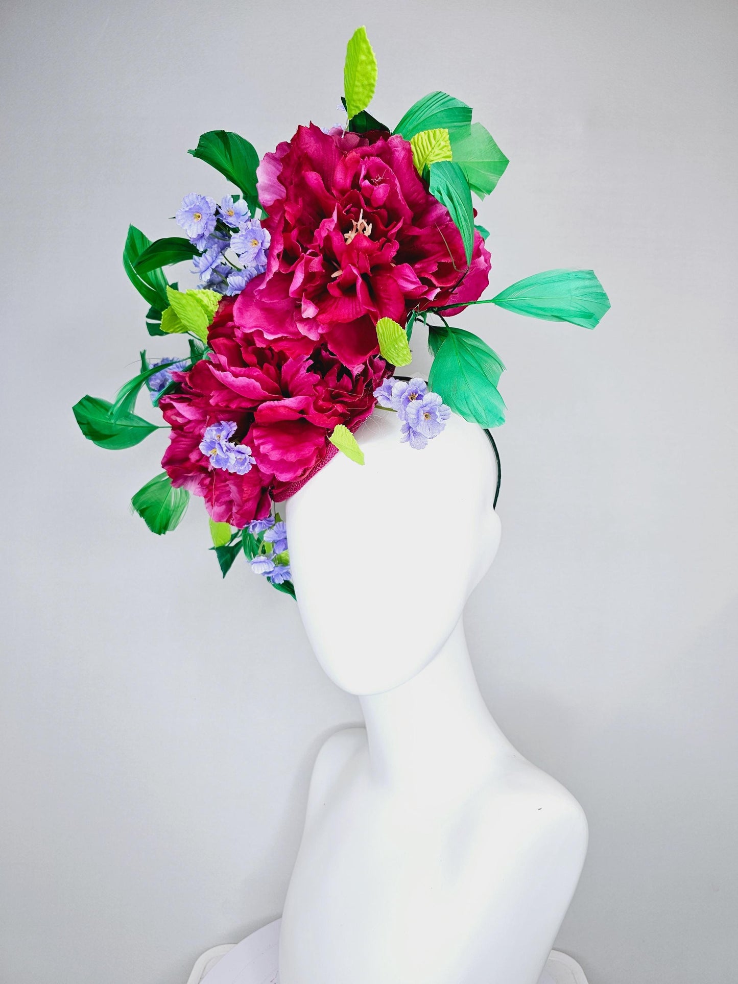 kentucky derby hat fascinator pink sinamay with pink fuchsia satin silk flowers, small light purple flowers,lime green leaves,green feathers