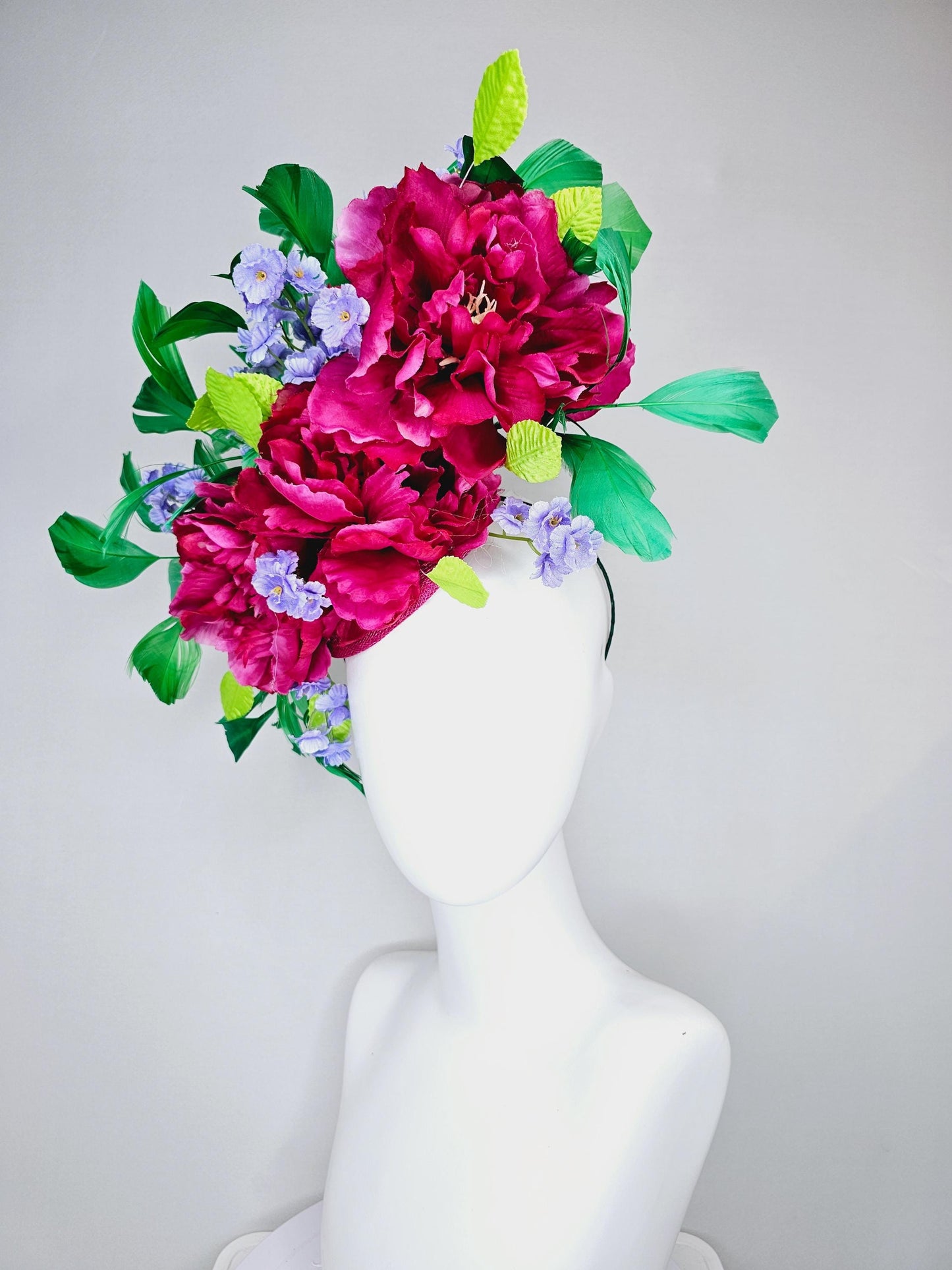 kentucky derby hat fascinator pink sinamay with pink fuchsia satin silk flowers, small light purple flowers,lime green leaves,green feathers