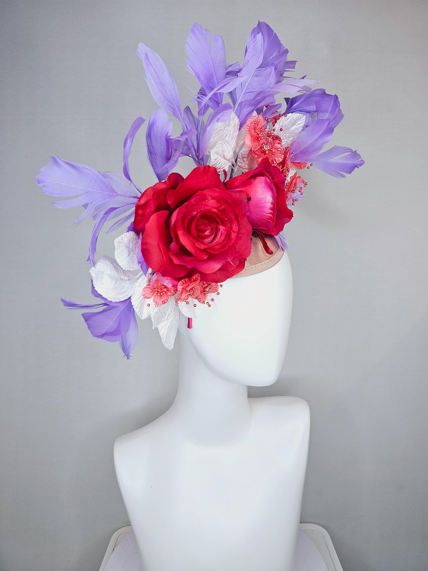 kentucky derby hat fascinator champagne satin,red satin rose flowers,small red coral flowers,white leaves,light purple lavender feathers